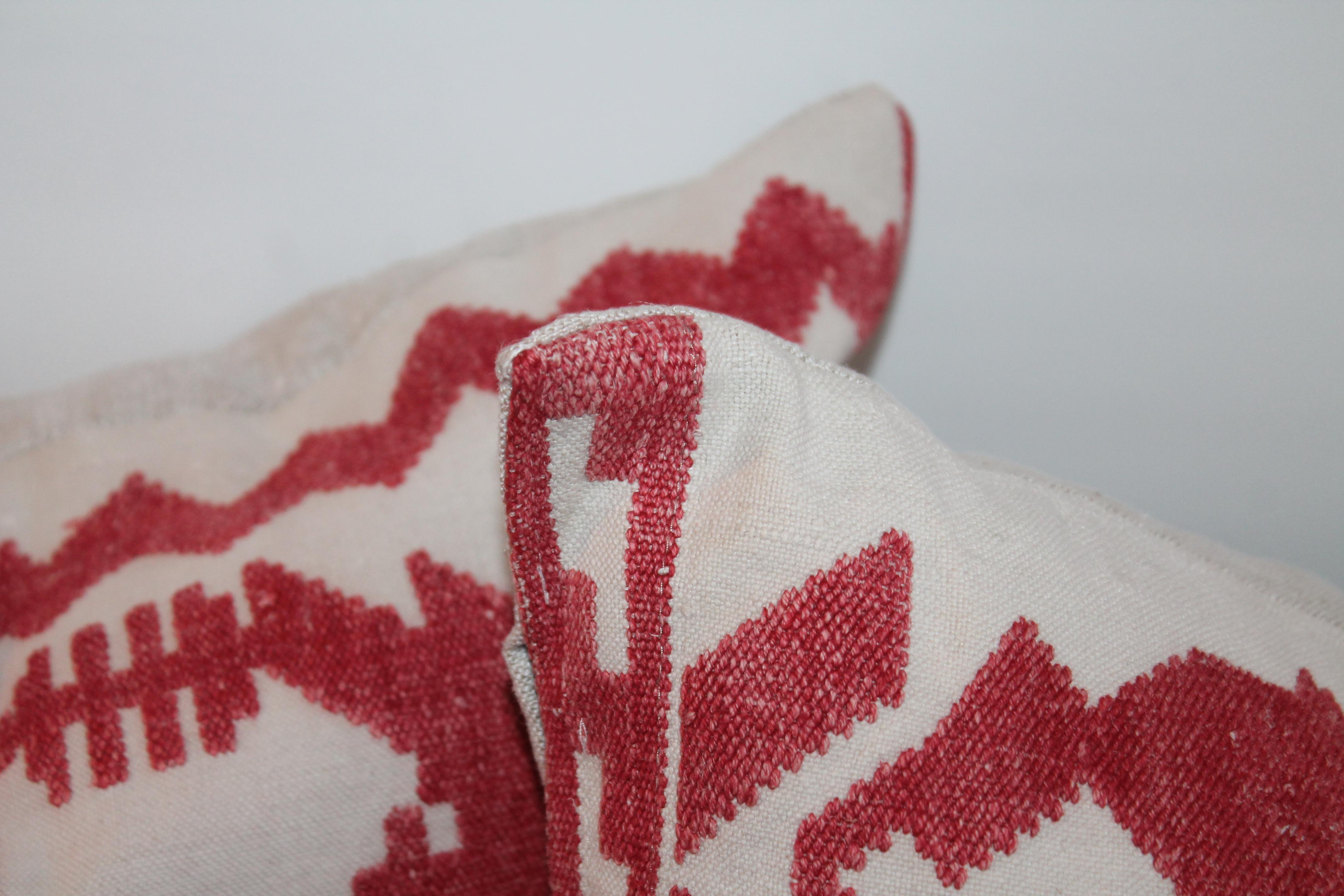 These amazing hand embroidered red threading on linen pillows are in fine condition. The pillows have side ties and down and feather inserts. One pair in stock.