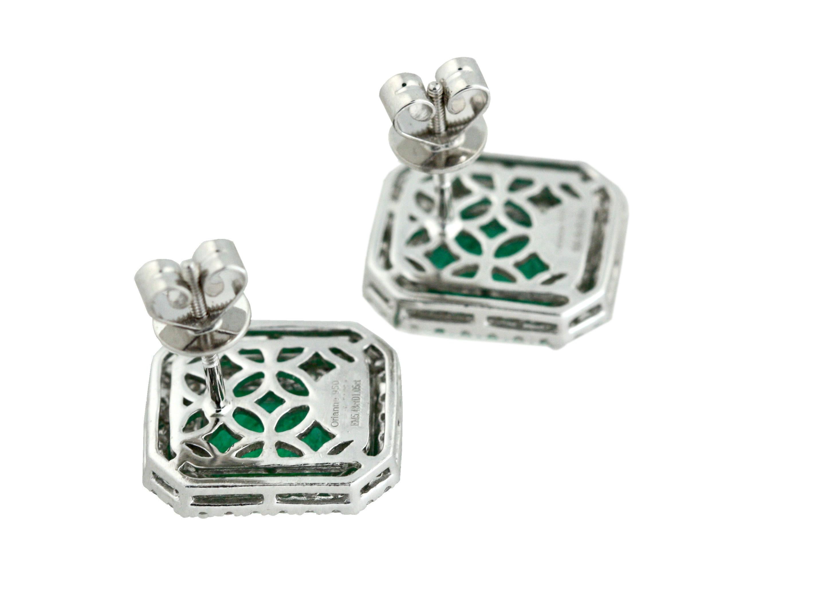 
Pair of Emerald and Diamond Earrings
Each of cluster design, set with a step-cut emerald within a border of circular-cut diamonds, post fittings, emeralds together weighing approximately 5.48 carats, diamonds weighing a total of approximately 1.05