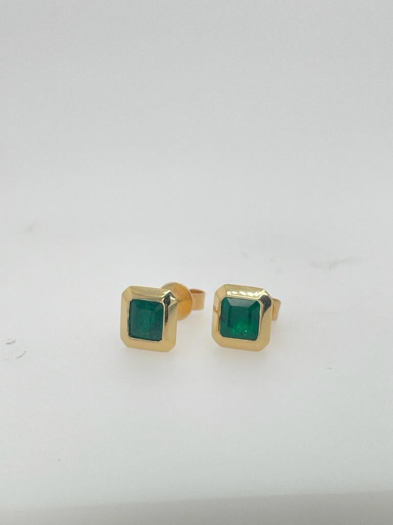 Pair of emerald earrings/ studs 18k gold studs bezel set  For Sale 1