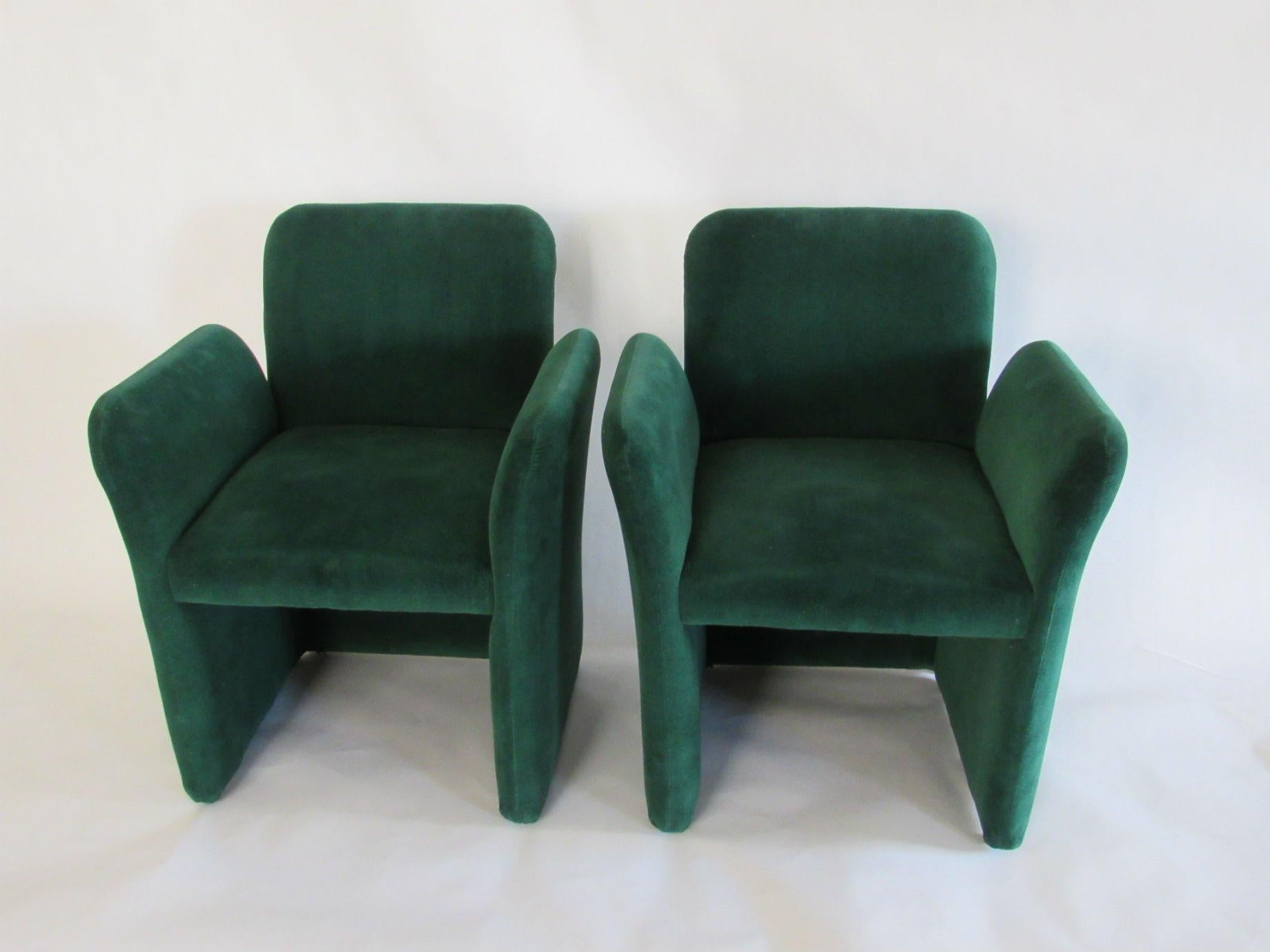 Pair of emerald green velvet upholstered armchairs by Leon Rosen for Pace 1980s. Pair of chairs with gently outwardly curved arms and original green velvet upholstery.
