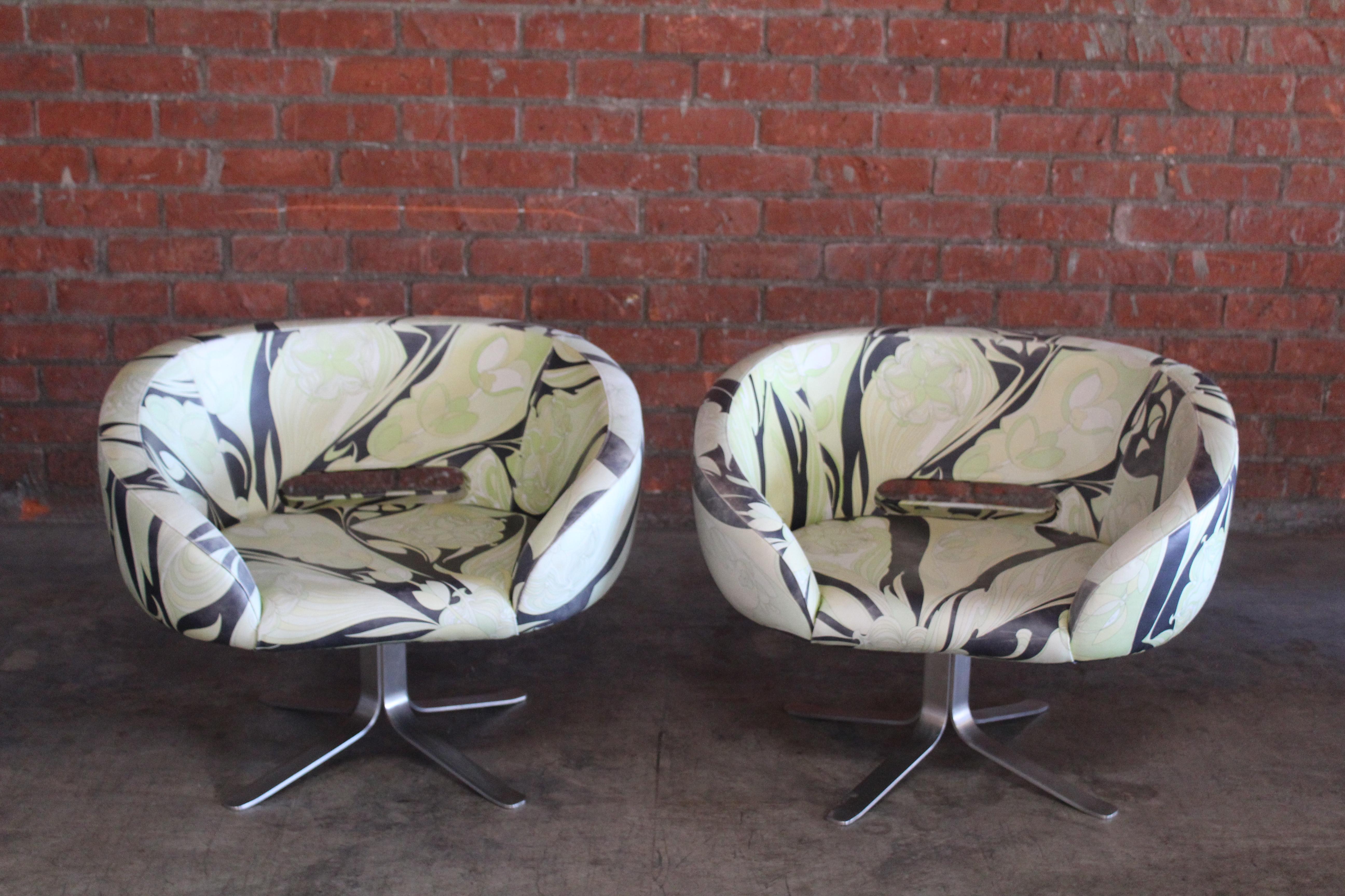 Rare pair of Rive Droit swivel chairs in Emilio Pucci leather by Cappellini, Italy, 2001.
The pair are in good condition with age appropriate wear to the Emilio Pucci printed leather. There is some fading to the leather. Sold as a pair.