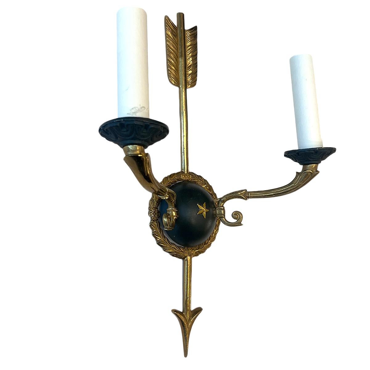 Pair of 1920's French sconces with arrow motif.

Measurements:
Height: 13.5