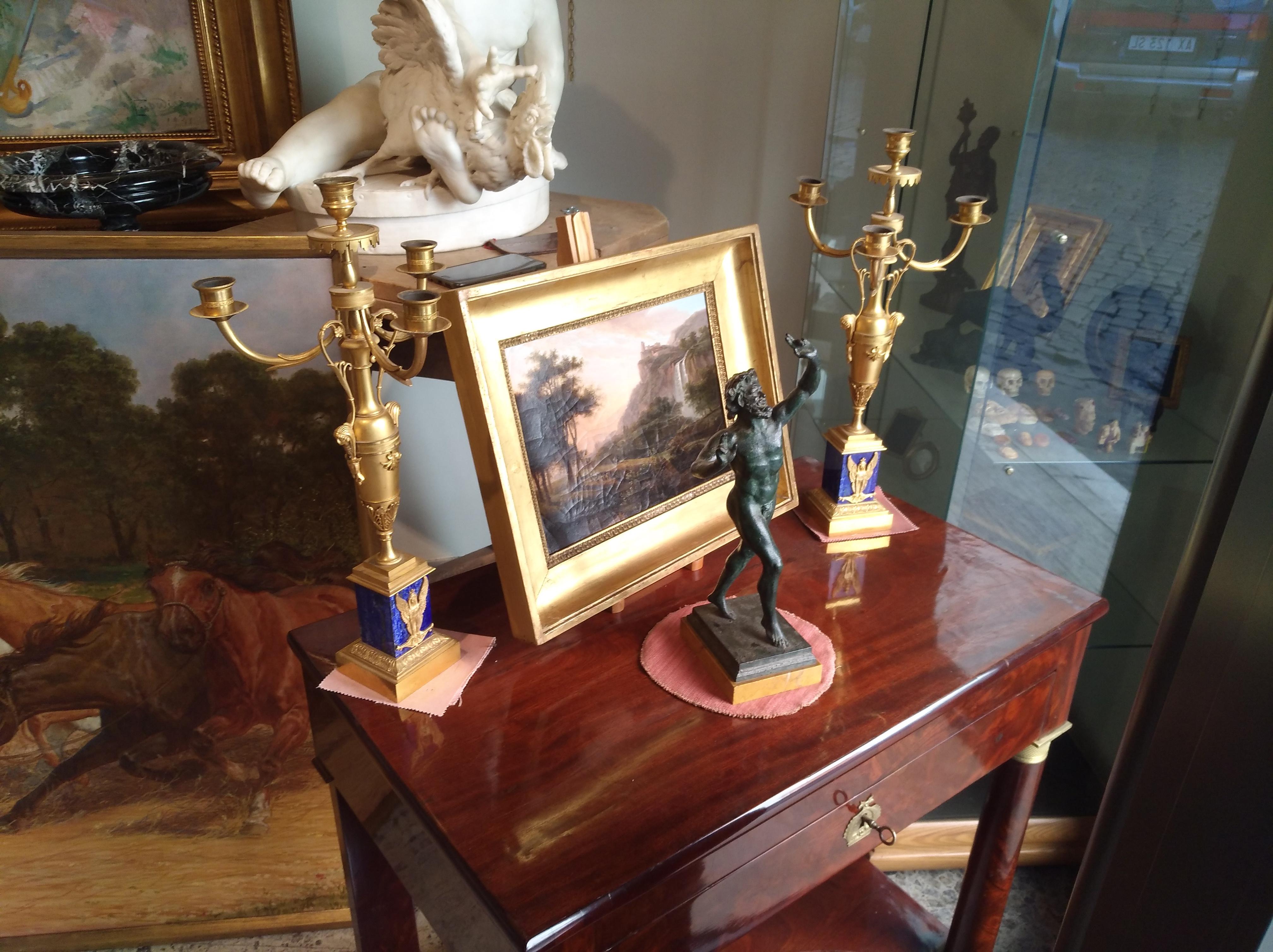 Pair of Empire Candlesticks Empire 1830 Lapis

Italian Fine Arts Authority must check this item in order to allow its exportation. This process lasts about 60 days.