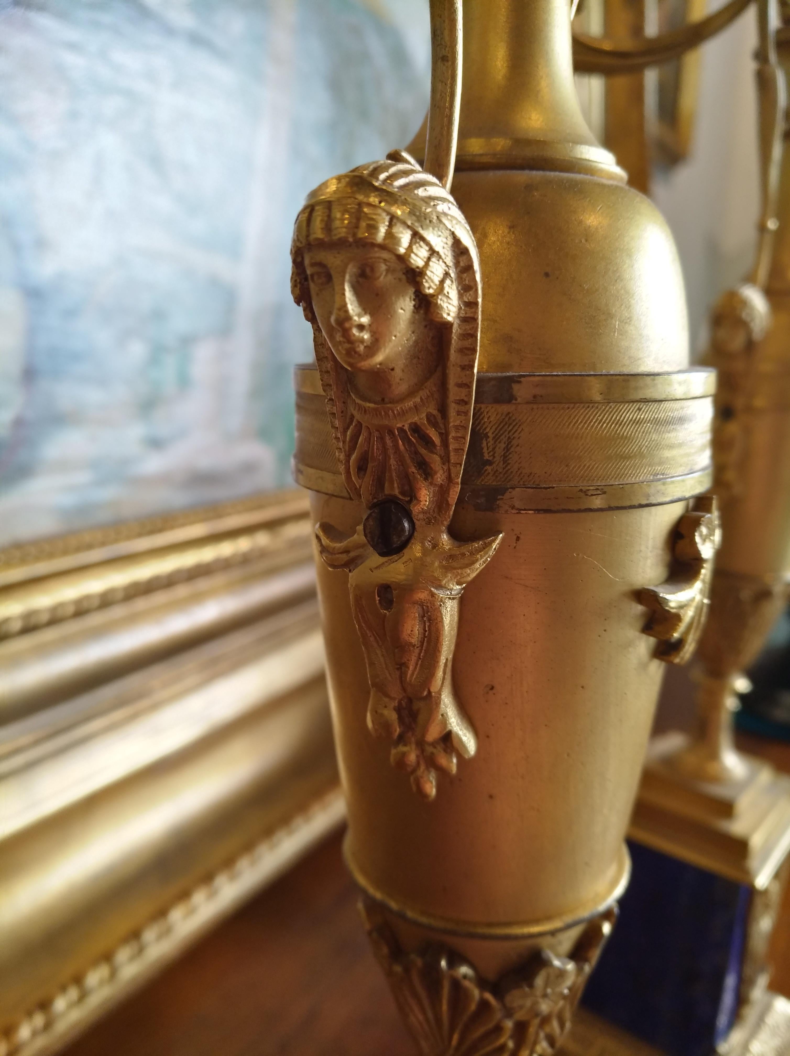 Early 19th Century Pair of Empire Candlesticks, Golden Bronze Lapis Bases Empire 1830 Sphinx For Sale