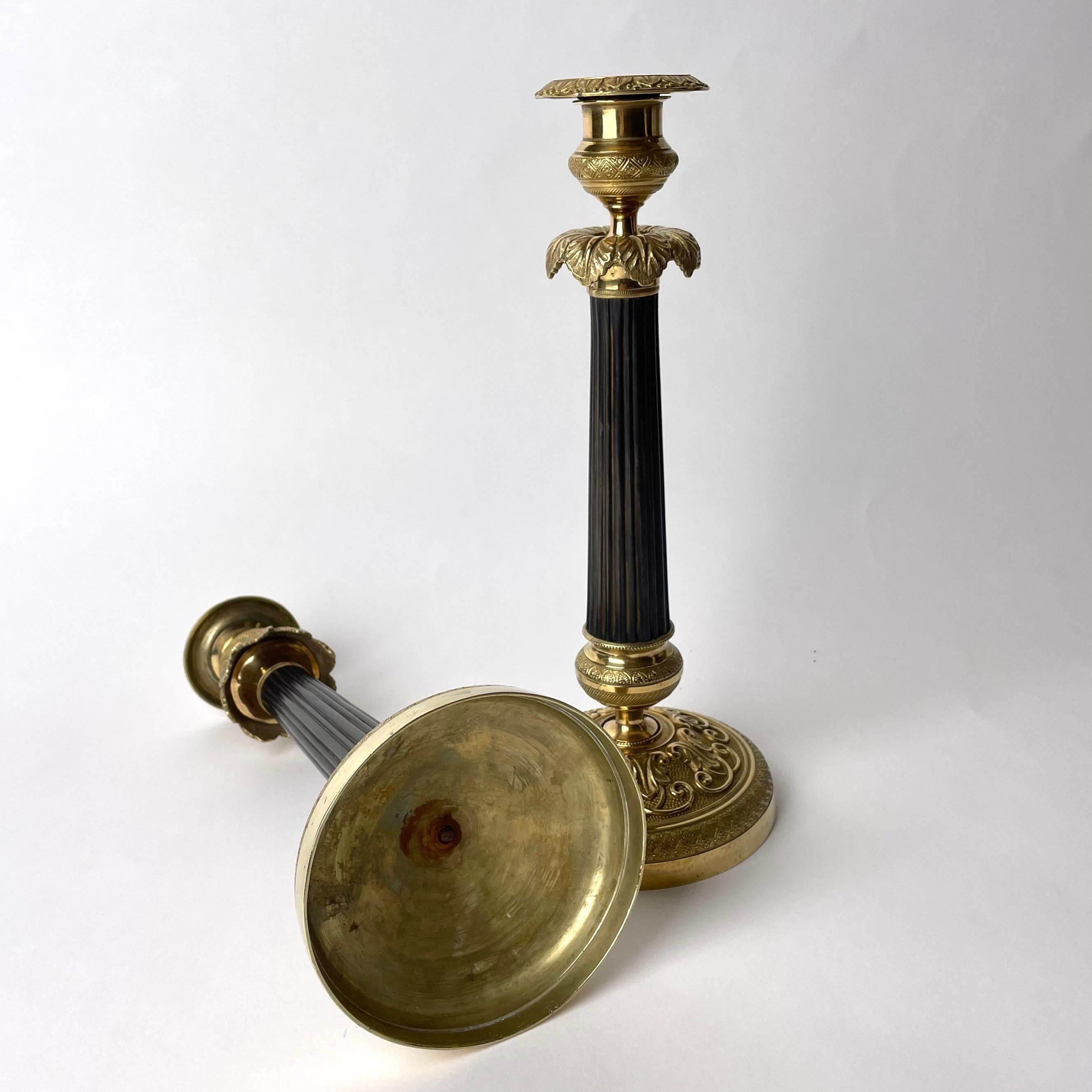 Pair of Empire Candlesticks in gilded and darkpatinated bronze from the 1820s For Sale 2