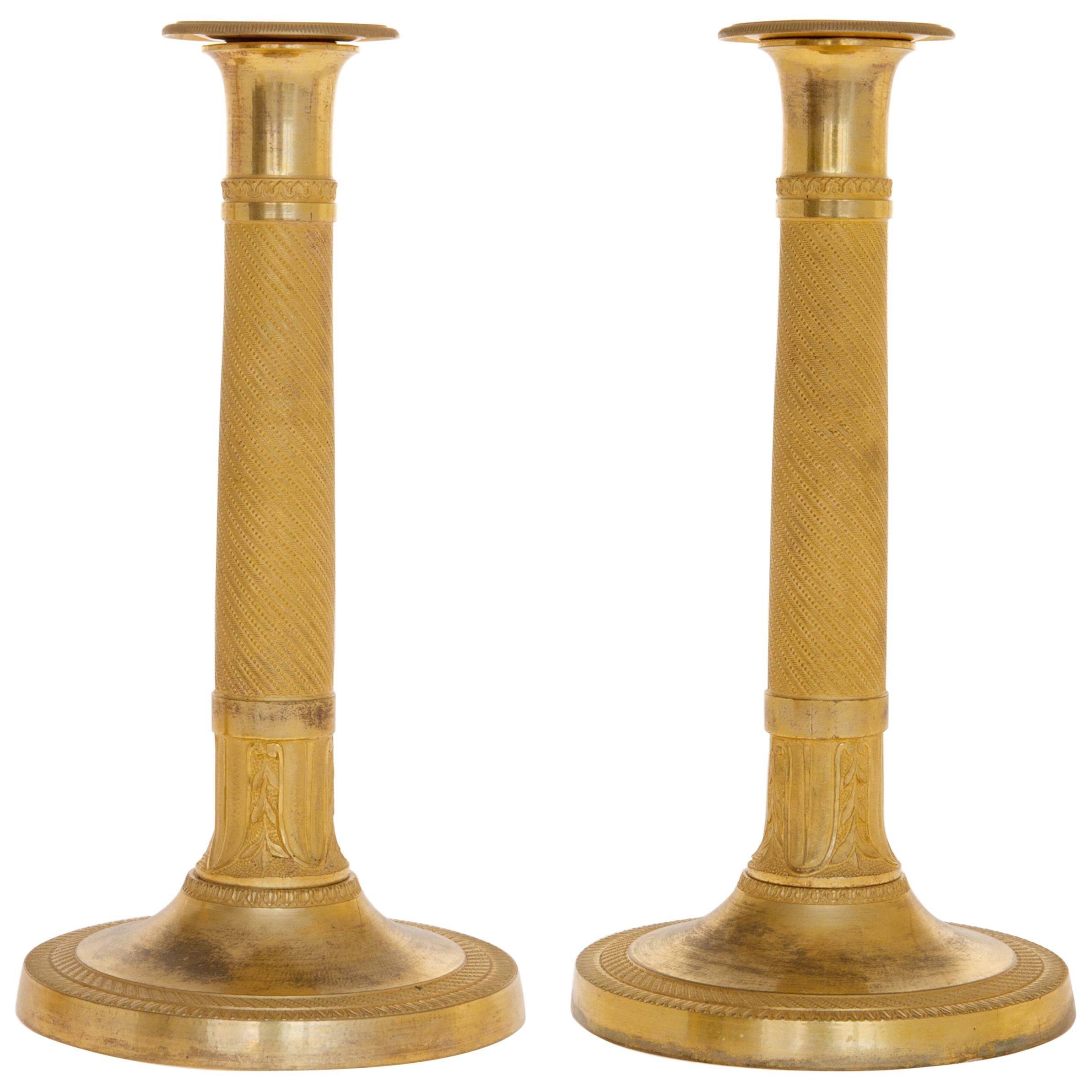 Pair of Empire Candlesticks in Gilded Bronze For Sale