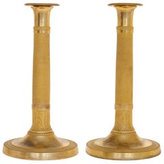 Pair of Empire Candlesticks in Gilded Bronze