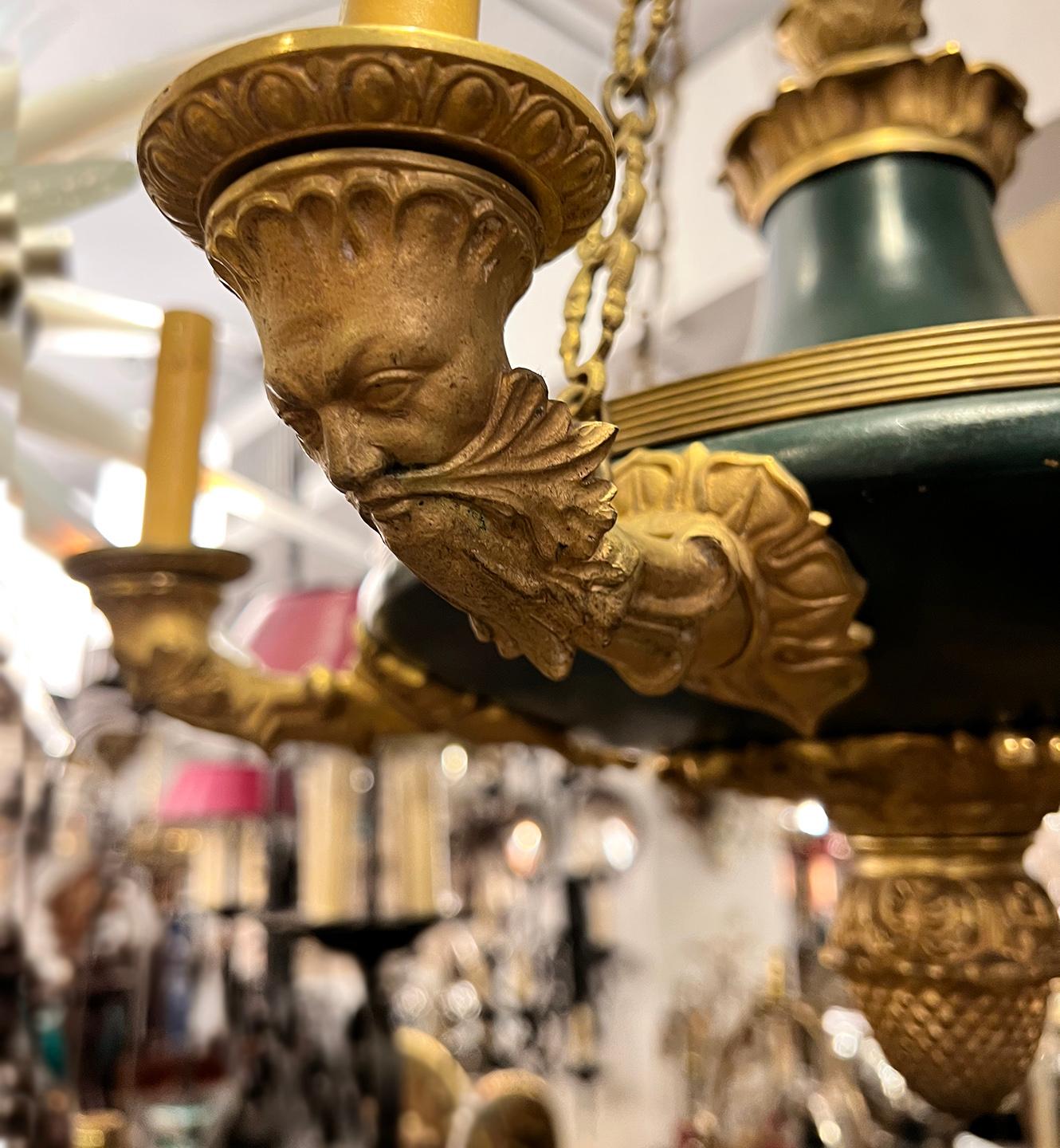 Pair of circa 1920's French empire style chandeliers. Sold individually.

Measurements:
Height : 36