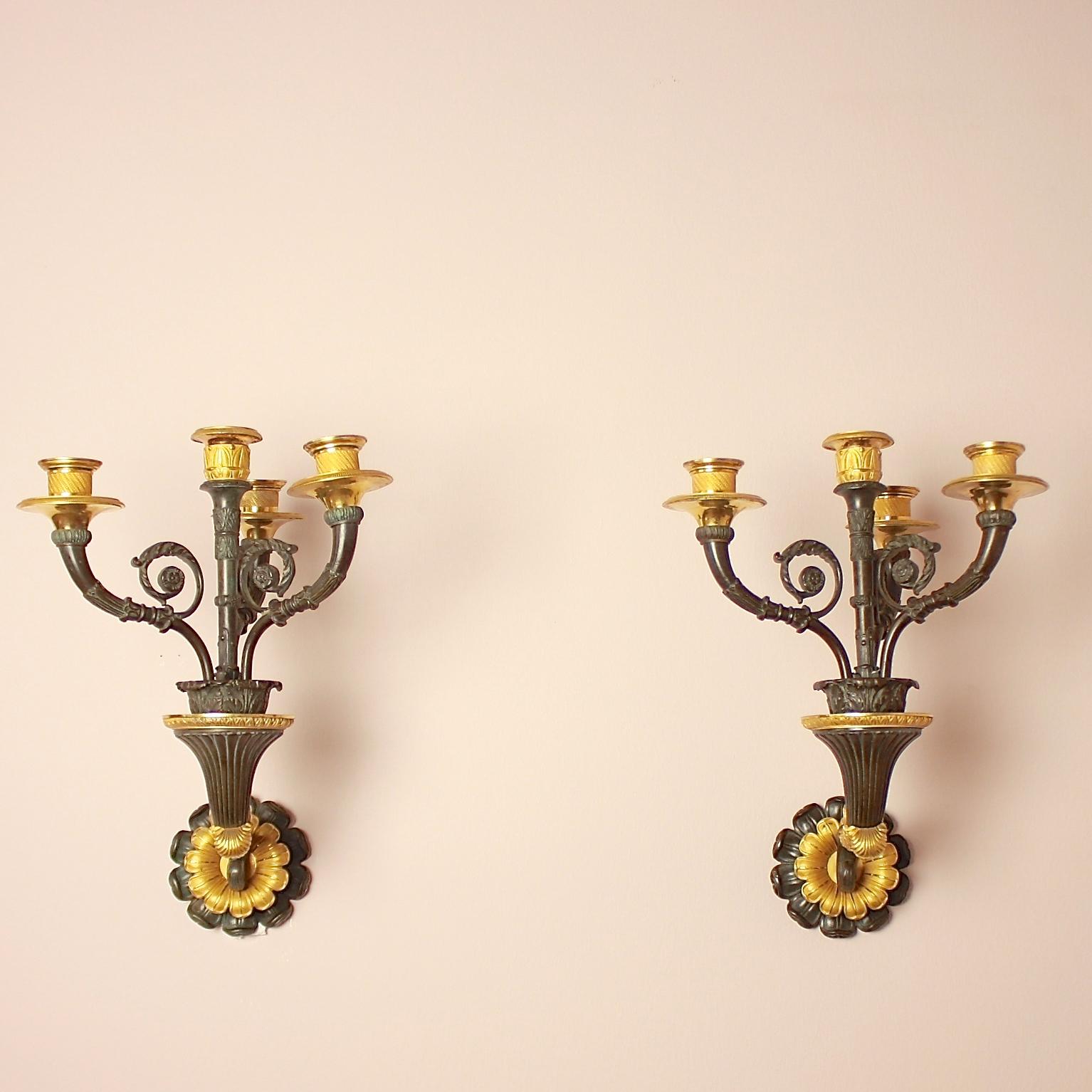 Early 19th Century Pair of Empire/ Charles X Gilt and Patinated Bronze Four-Light Wall Appliques For Sale