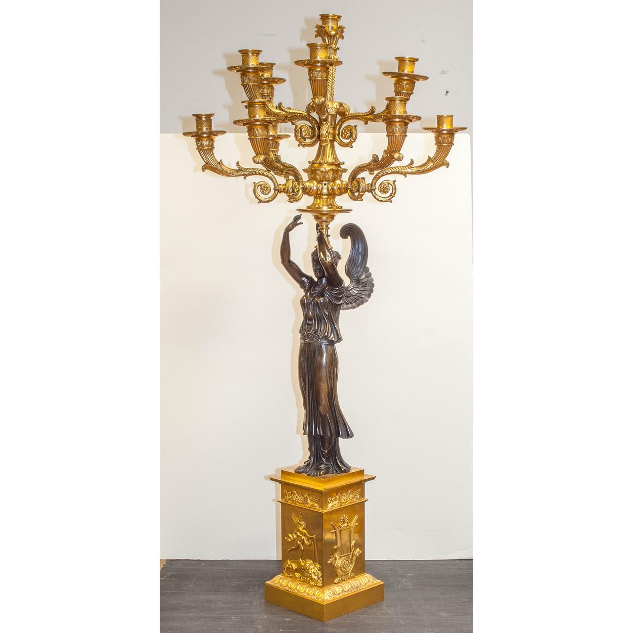 A magnificent pair of Empire ormolu and patinated bronze figural ten-light candelabra

Date: 19th century
Origin: French
Size: 40 inches high.