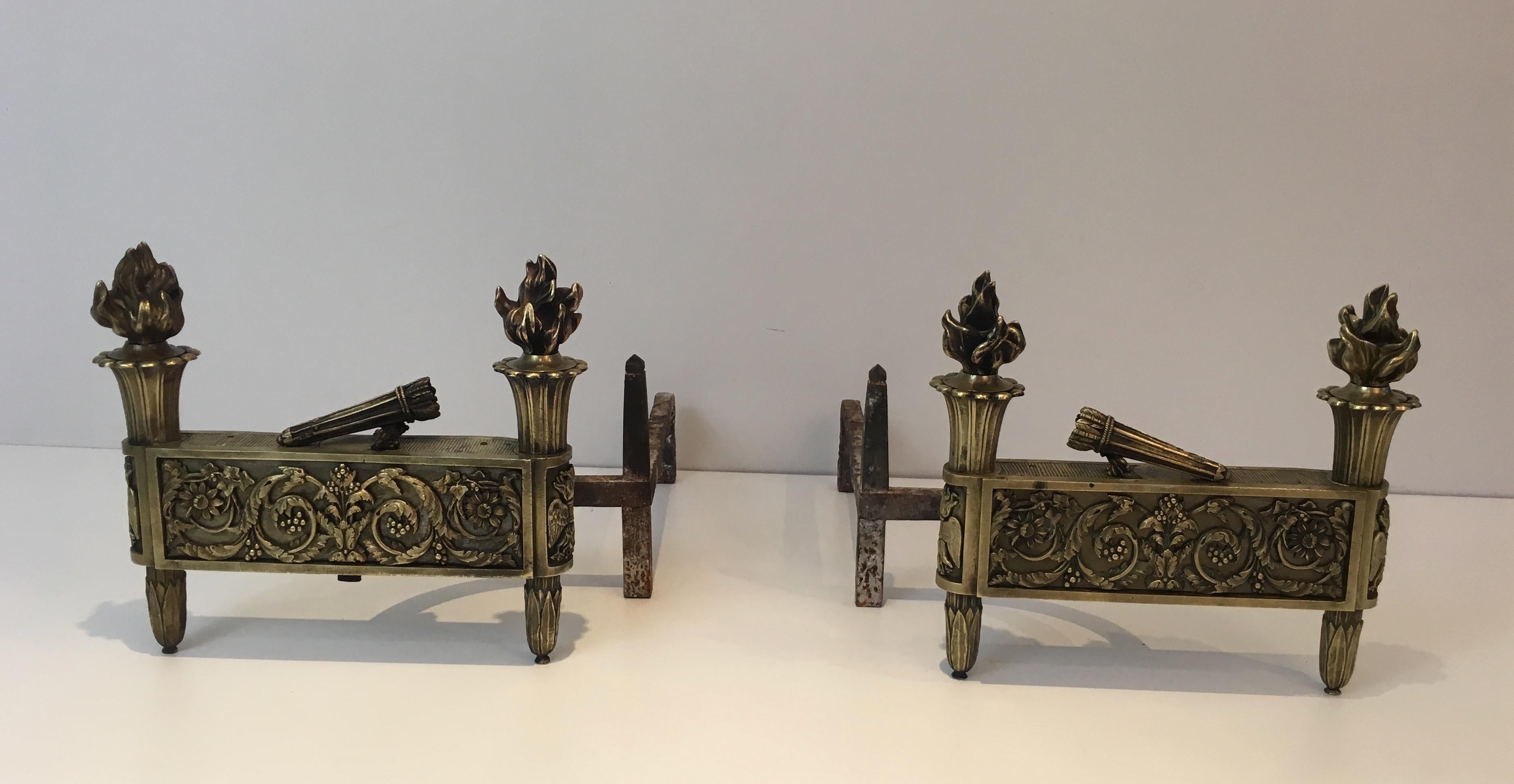 This pair of andirons are made of bronze. These are French, from Empire period, circa 1850.