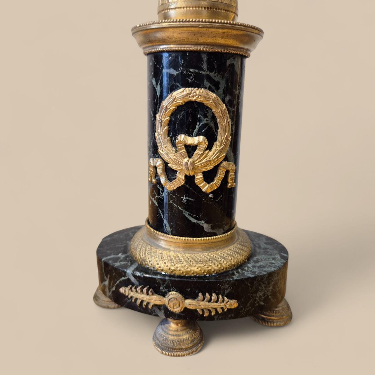 Pair of Empire-period Victory candelabra in marble and gilt bronze, c. 1800

This elegant pair of Empire-period candelabra, dating from around 1800, combines the noble materials of marble and finely worked gilt bronze. 

Each piece is surmounted by