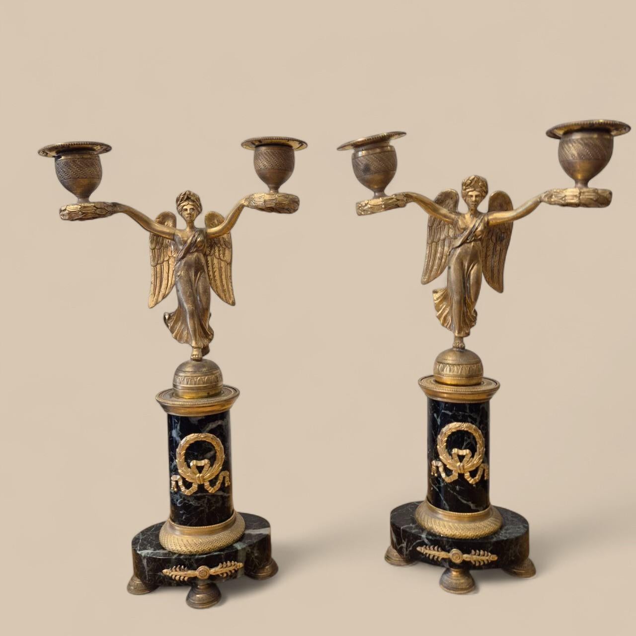 Hand-Carved Pair of Empire-period Victory candelabra in marble and gilt bronze, circa 1800 For Sale