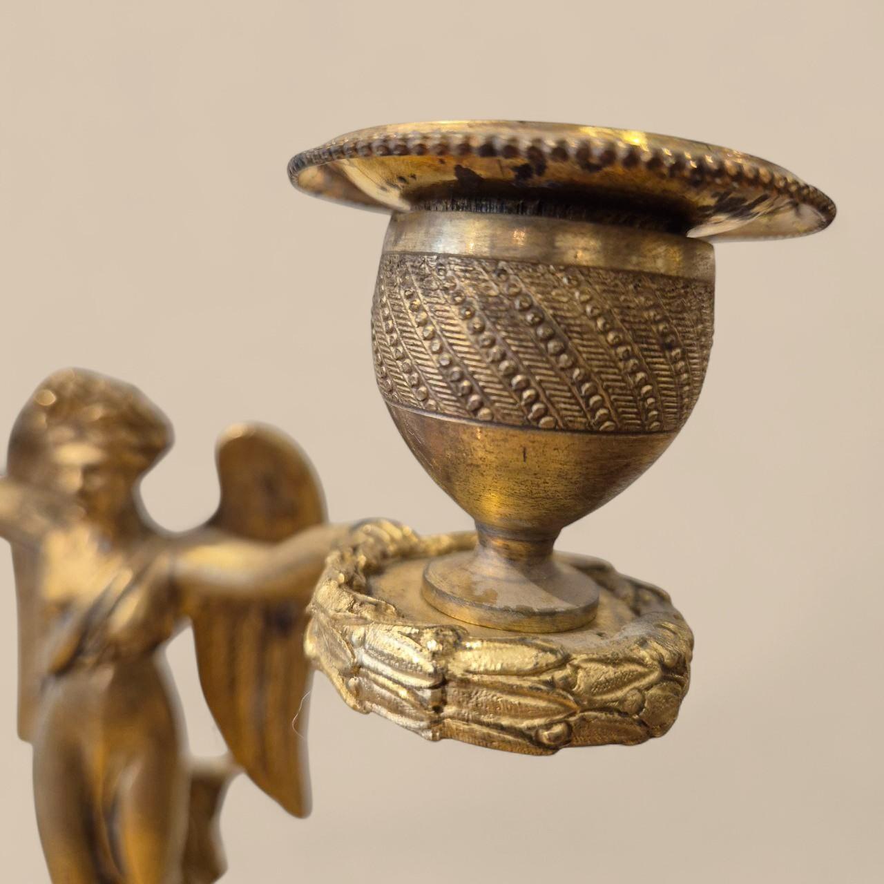 Early 19th Century Pair of Empire-period Victory candelabra in marble and gilt bronze, circa 1800 For Sale