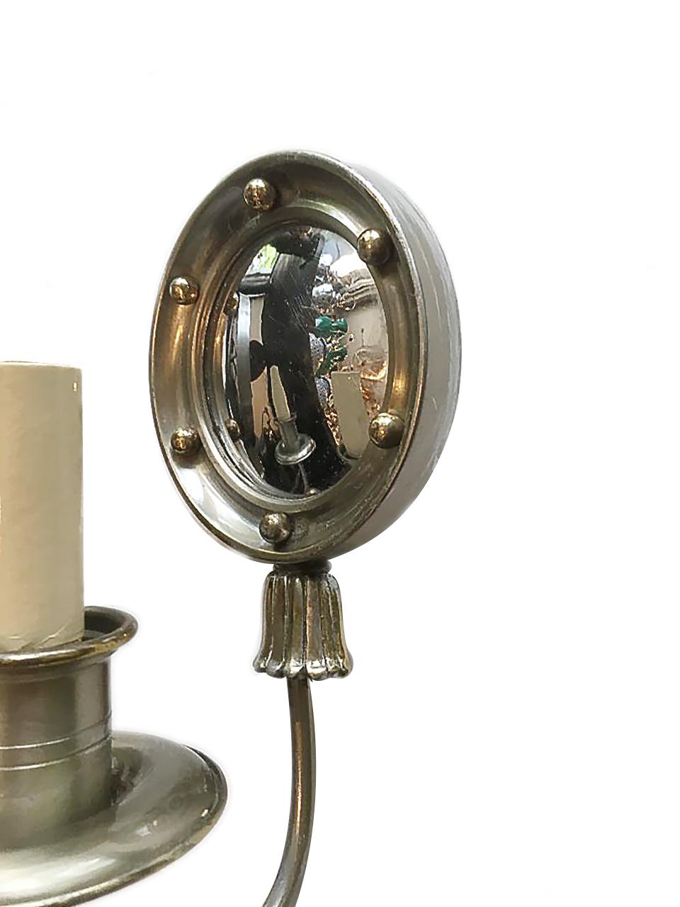 A pair of 1940s French pewter sconces with convex mirror inset.

Measurements:
Height 9