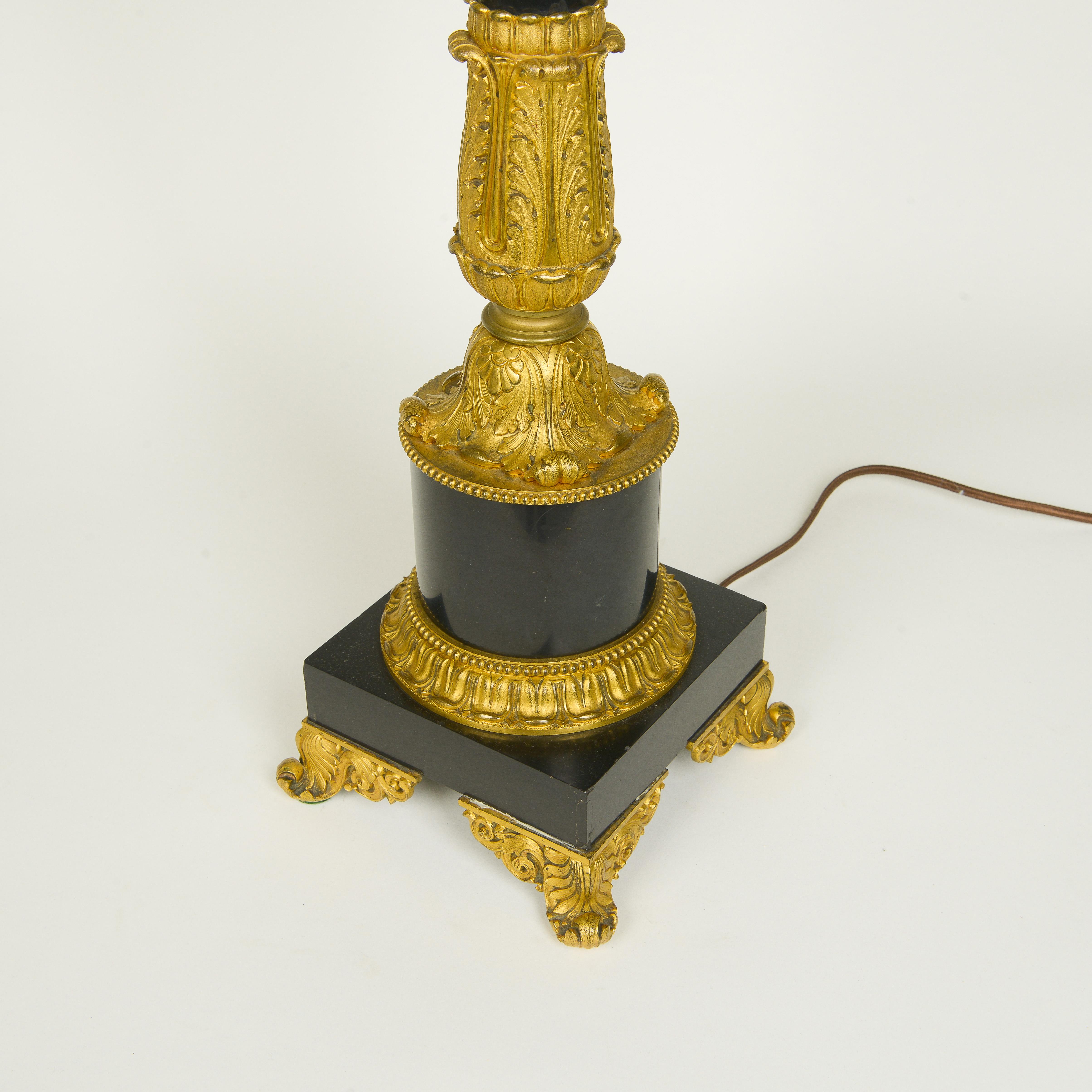 Pair of Empire Style Black Stone and Ormolu Lamps In Excellent Condition For Sale In New York, NY