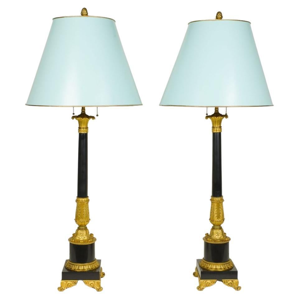 Pair of Empire Style Black Stone and Ormolu Lamps For Sale
