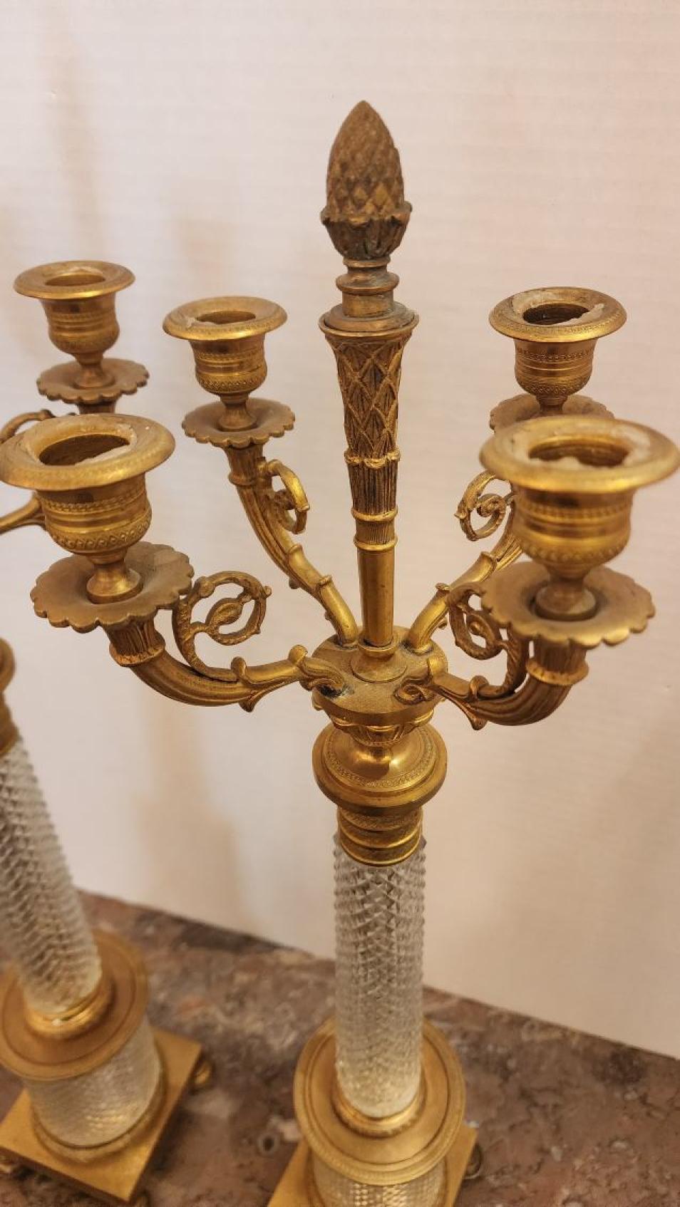 Late 19th/20th c., four-arm, diamond cut crystal and gilt bronze candelabra, drilled for lamps but not electrified, unmarked