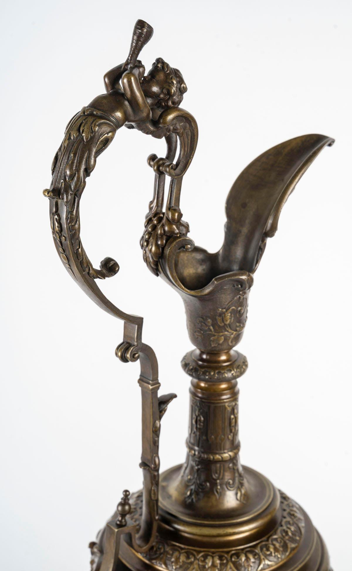 Patinated Pair of Empire Style Bronze Ewers, Late 19th or Early 20th Century. For Sale