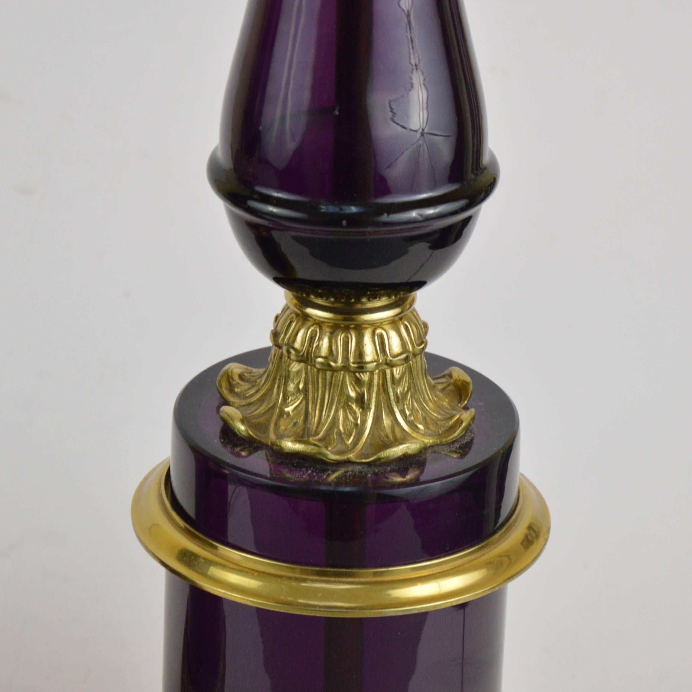 Pair of Empire style bronze-mounted amethyst glass lamps. Measures: Height 56 cm.