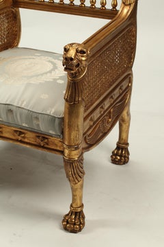 Pair of Empire Style Carved Wood and Gilded Armchairs