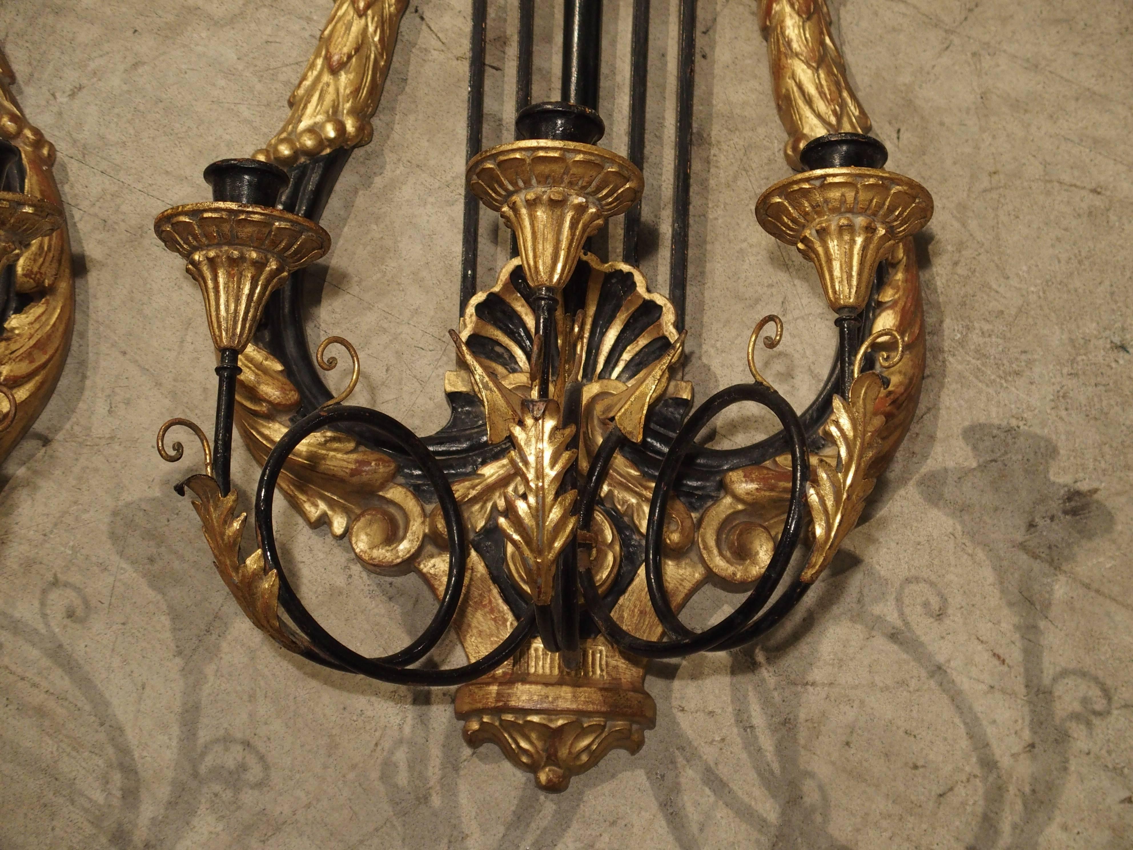 20th Century Pair of Empire Style Carved Wood and Metal Sconces from Italy