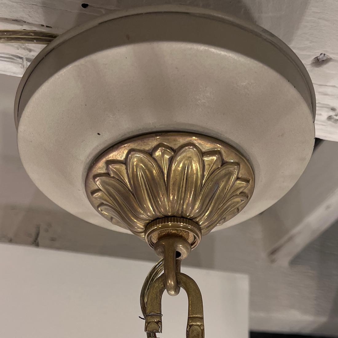 A pair of circa 1900's French Empire-style 6-arm chandelier. Sold individually.

Measurements:
Height: 28