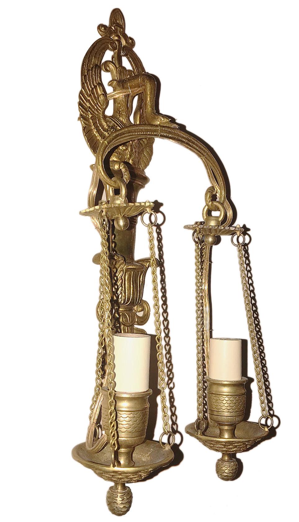Pair of French circa 1900s two-arm sconces with swan motif and gilt finish.

Measurements:
Height 13