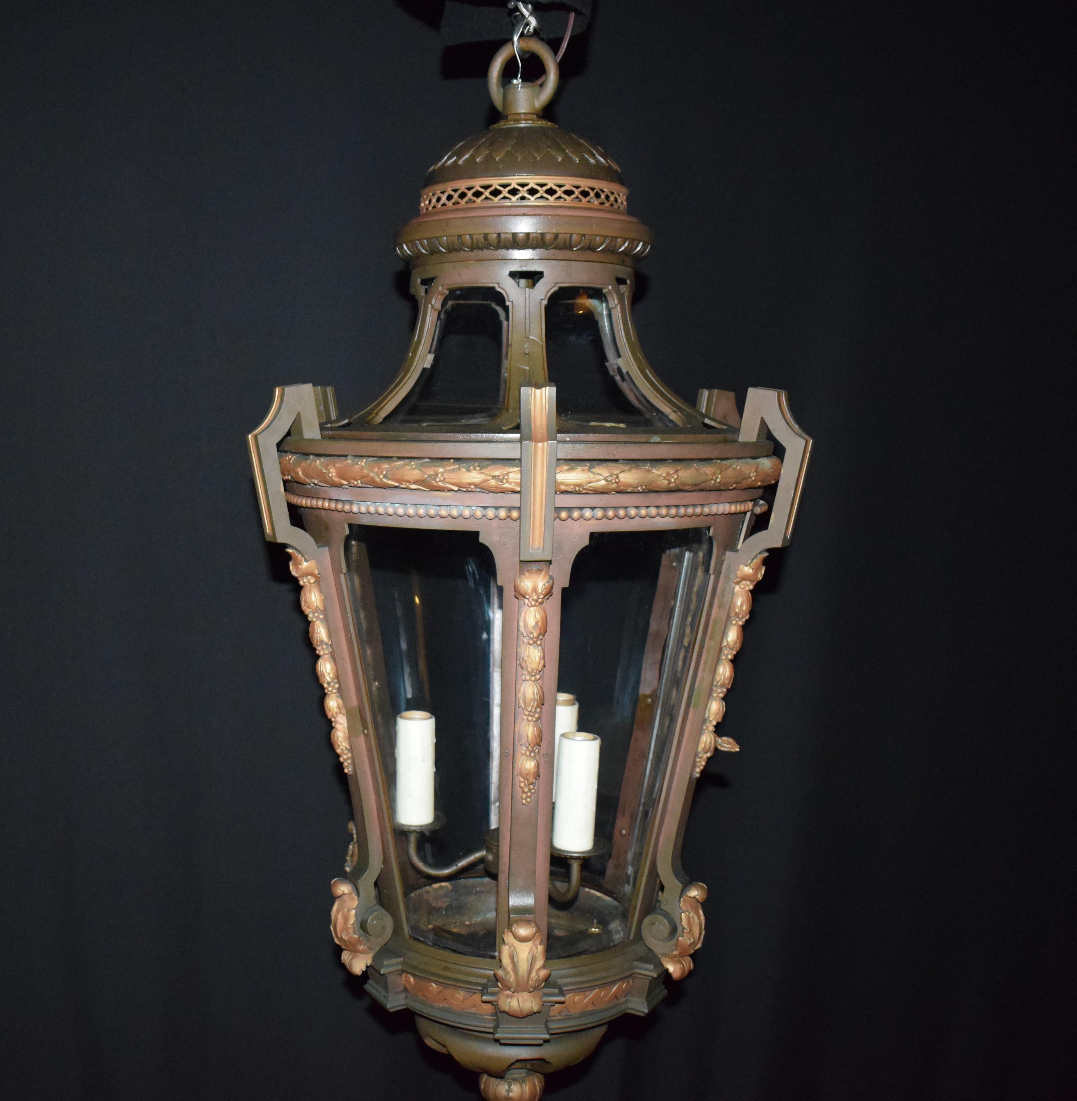 A superb Louis WVI style lantern. Two toned patinated bronze, with curved glass panels. 3-light,
France, circa 1900.
Apparently unmarked. Measures: Height 42