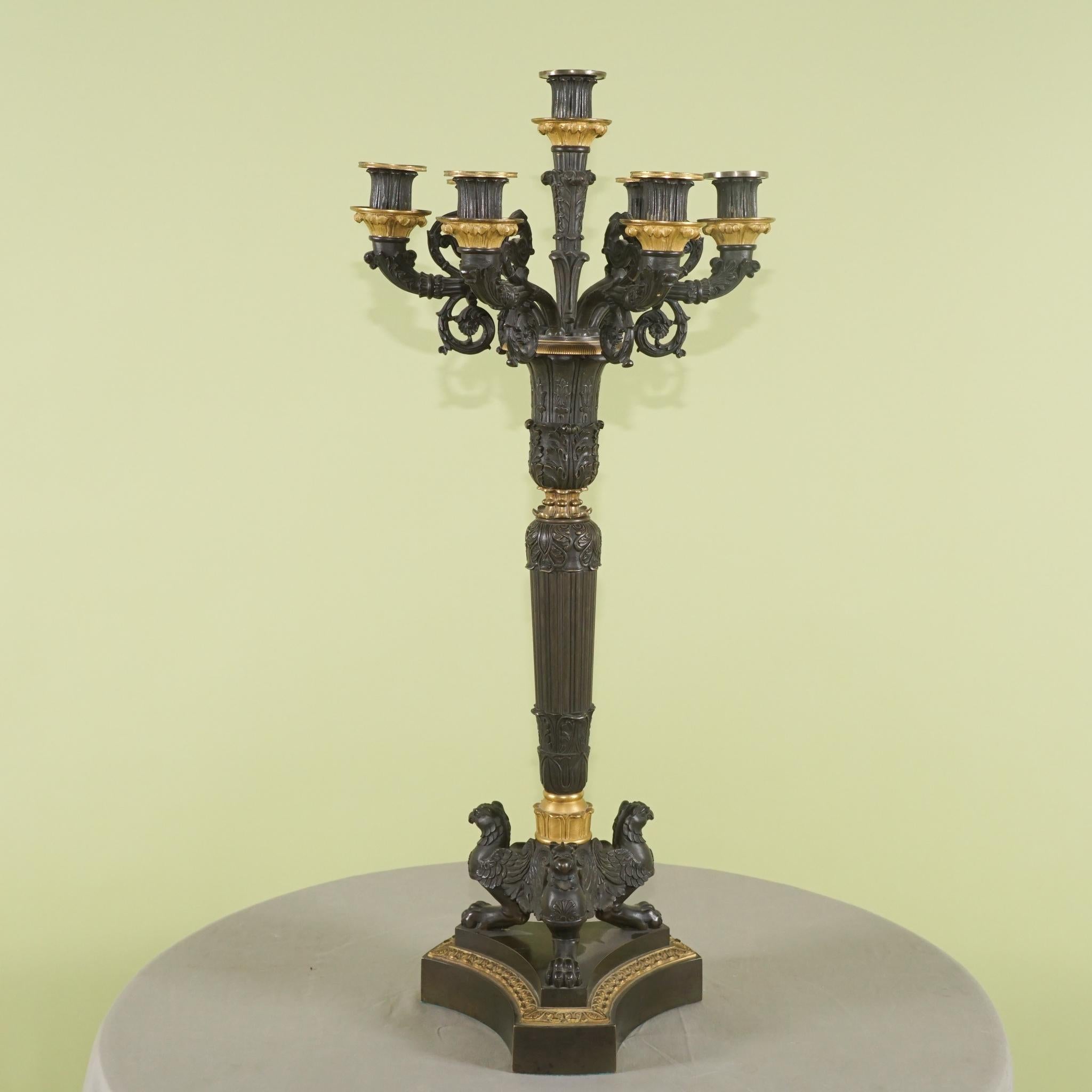 Cast Pair of Empire Style Patinated and Gilded Bronze Candelabra For Sale