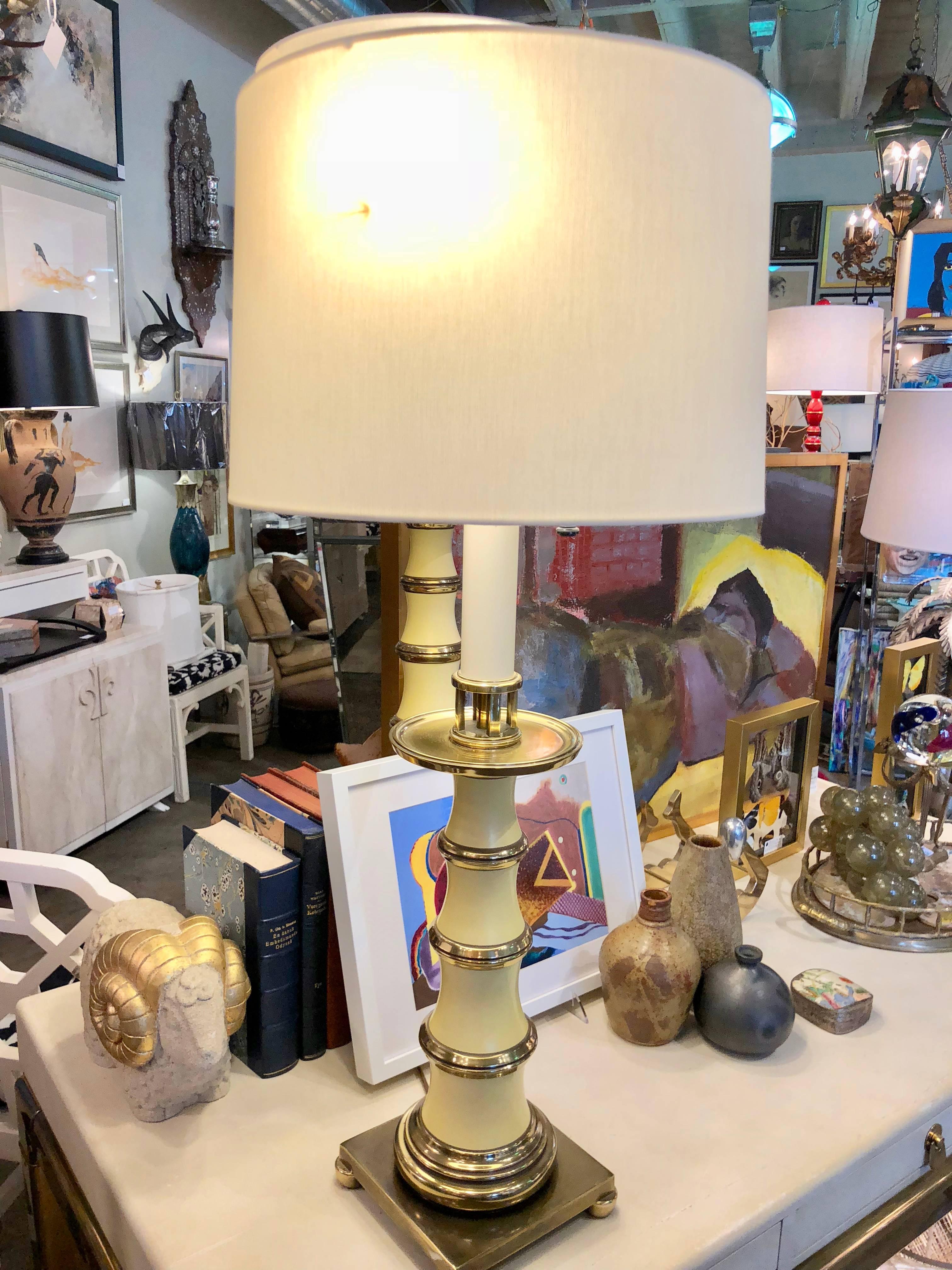 Pair of pale yellow enamel and brass table lamps by Stiffel. Having gold label marked 