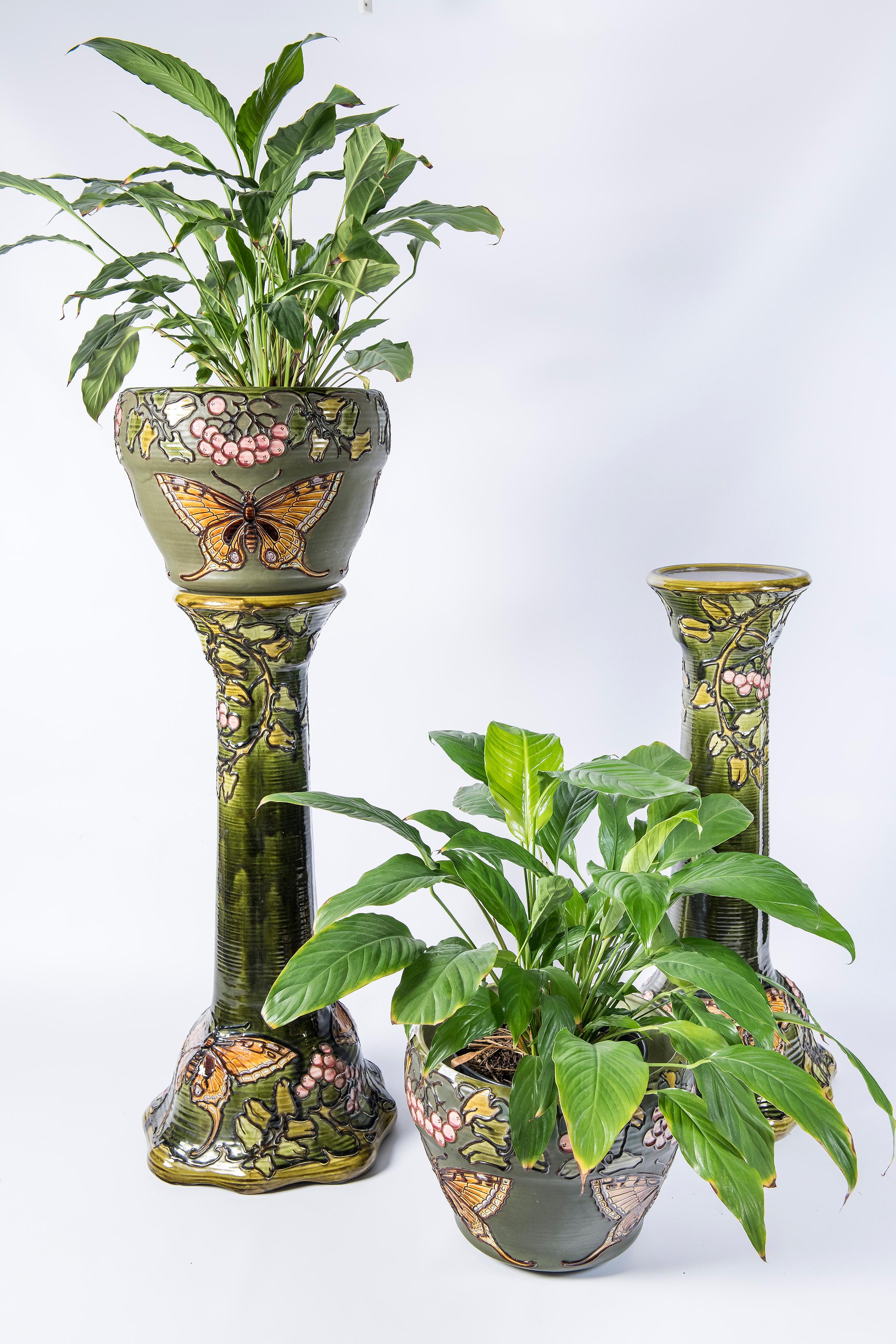 Pair of enamel ceramic planters. Art nouveau period. France, circa 1900.