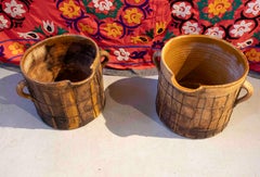 Pair of Enameled Ceramic Milk Churns with Handles & Iron Netting Covering Them