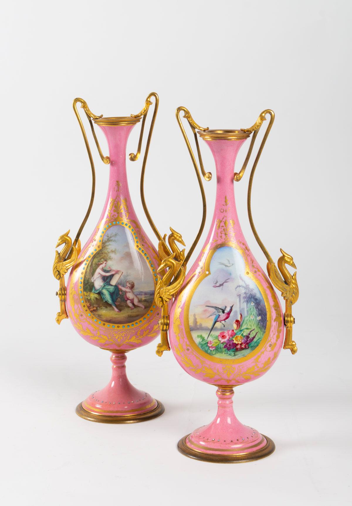 Pair of vases in enameled porcelain and gilded bronze, Napoleon III period, 19th century. Different paintings on the four faces. Very good quality.
Measures: H 30cm, W 14cm, P 9cm.