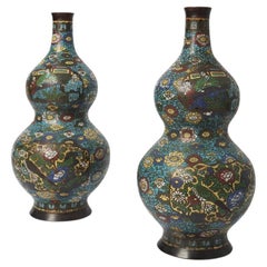 Pair of enamels double gourd vases, 19th c.