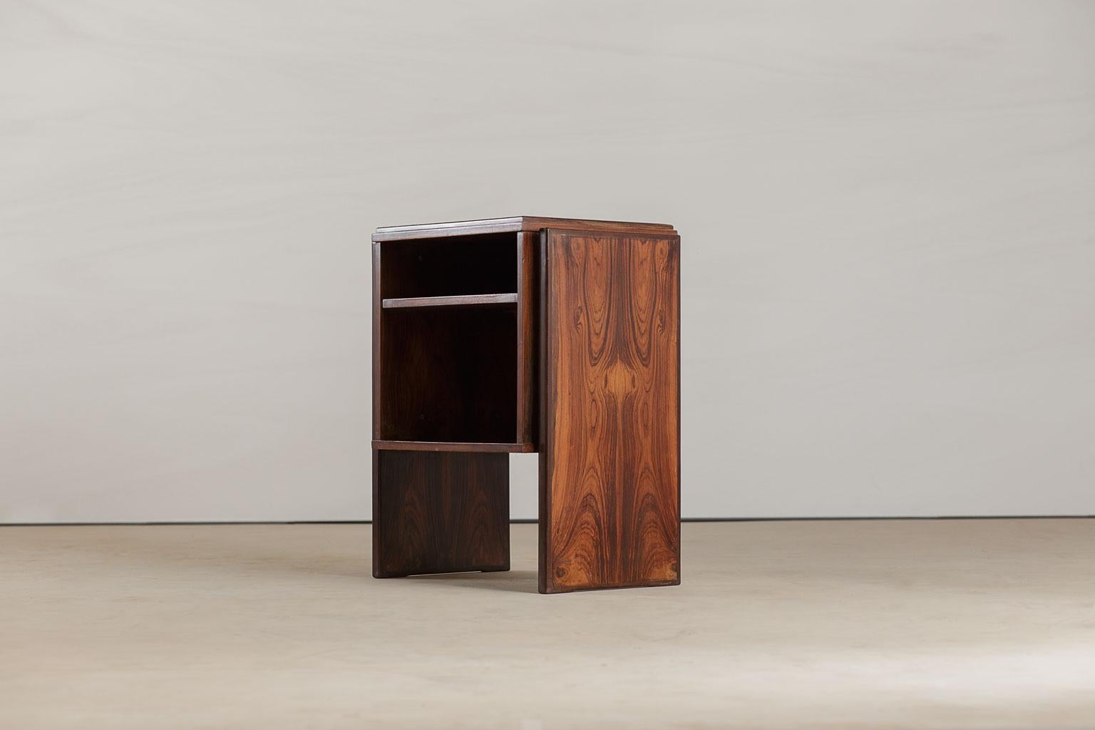 Vintage rosewood end tables designed by Brazil’s Joaquim Tenreiro. This desk came from the
Bloch, Editores headquarters, a building designed by Oscar Niemeyer and with interiors furnished by Sergio Rodrigues and Joaquim Tenreiro.

The tables can
