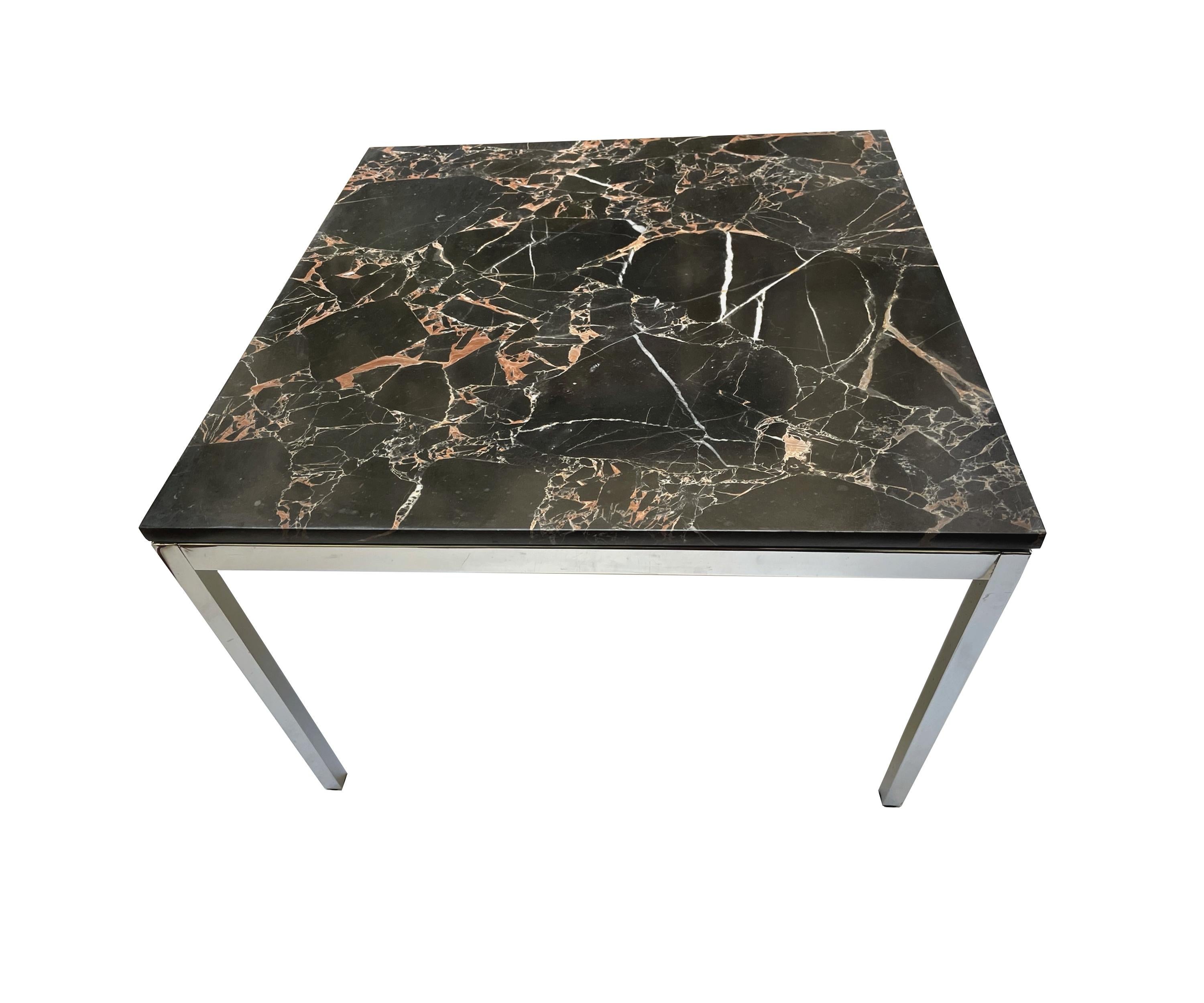 Pair of original end tables, Florence Knoll for Knoll International, circa 170.
Bases in chromed metal.
Trays in Calacatta black marble.
In very good condition.