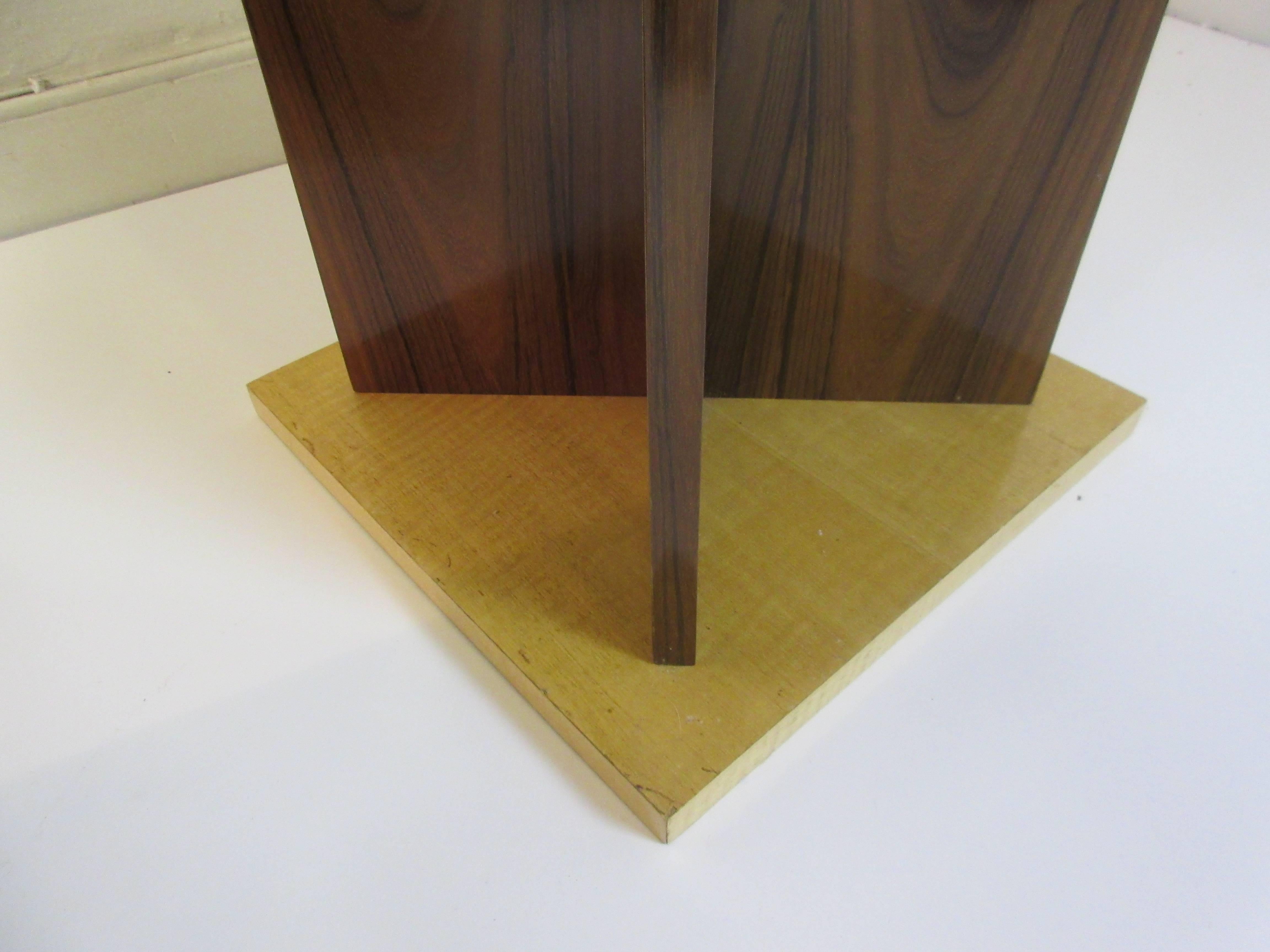 Pair of end tables in the Art Deco style from the 1990s in a light birch and darker walnut. Top and base of birch with X walnut pedestal support between the two.