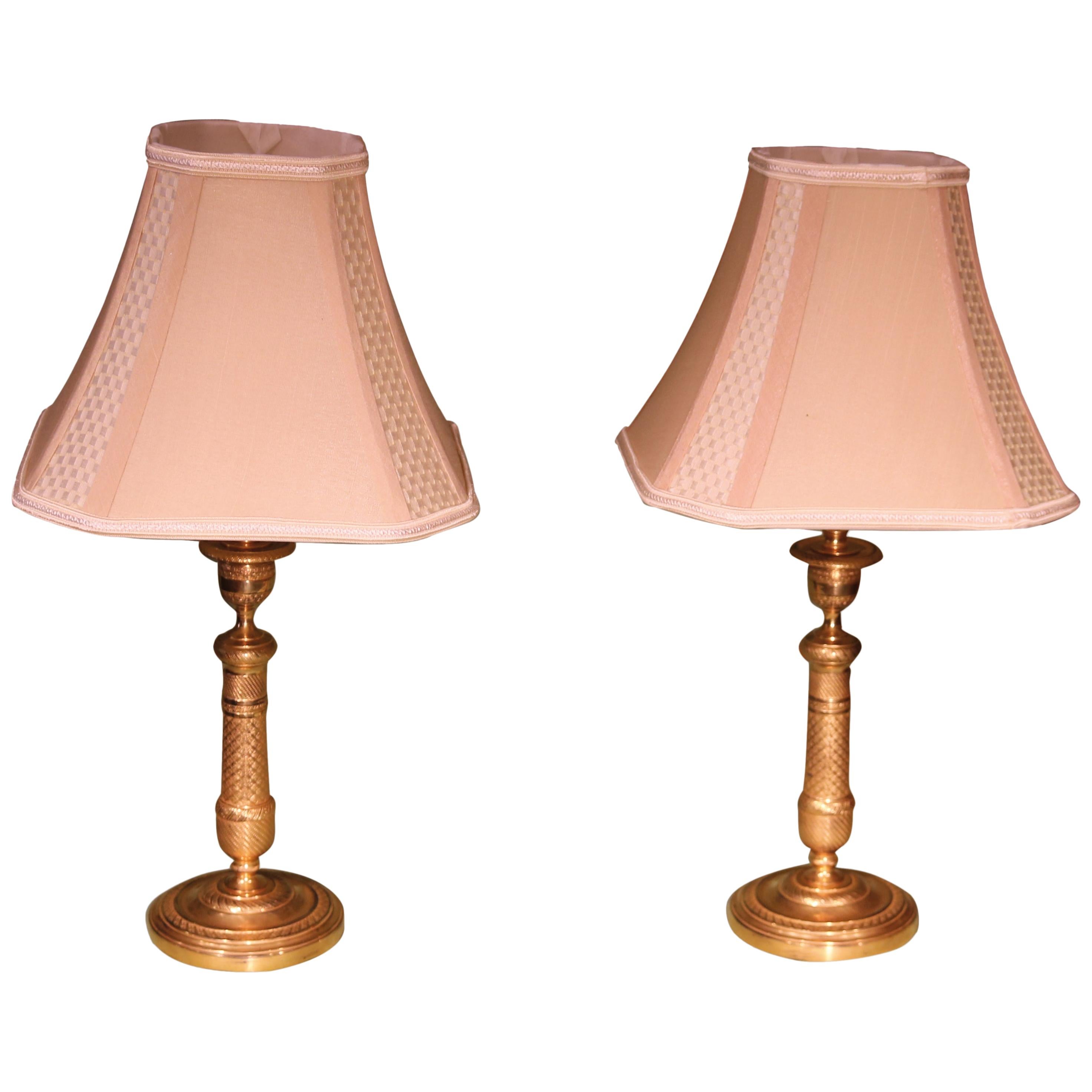 Pair of Engine Turned Ormolu Candlestick Lamps