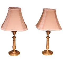 Pair of Engine Turned Ormolu Candlestick Lamps