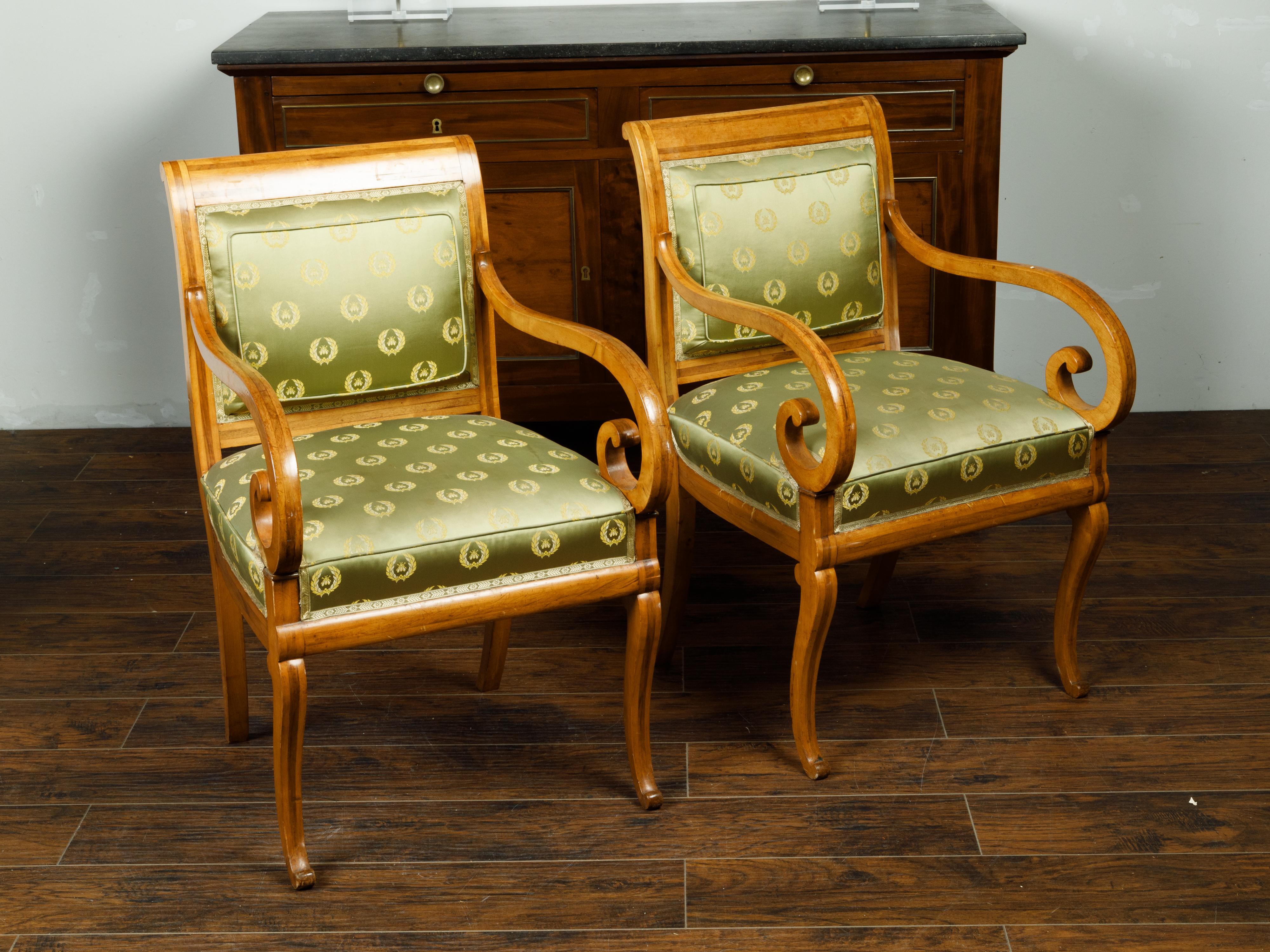 Upholstery Pair of English 1830s Regency Walnut Upholstered Armchairs with Scrolling Arms For Sale