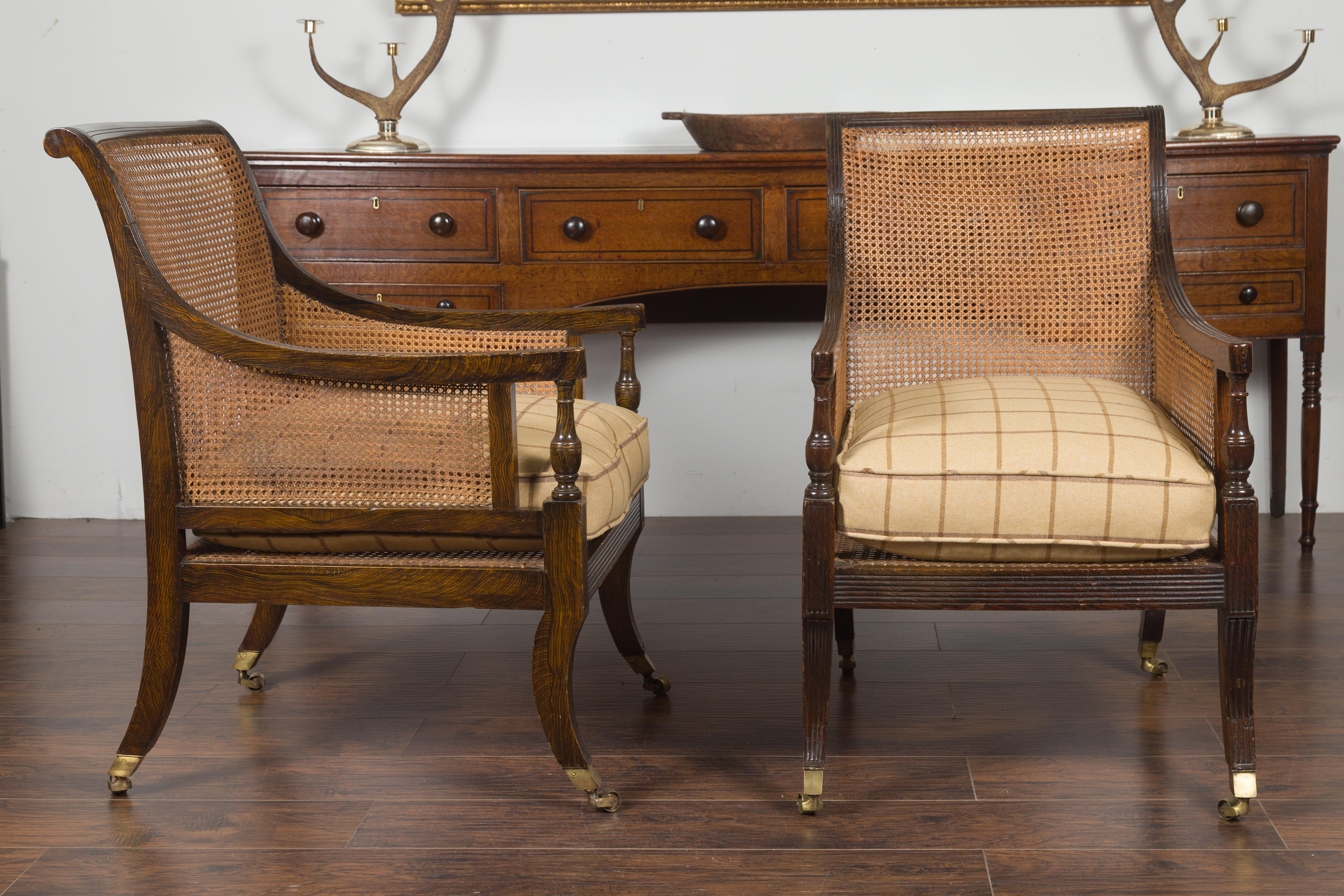 Pair of English 1870s Cane and Oak Library Chairs with Cushions and Casters 6