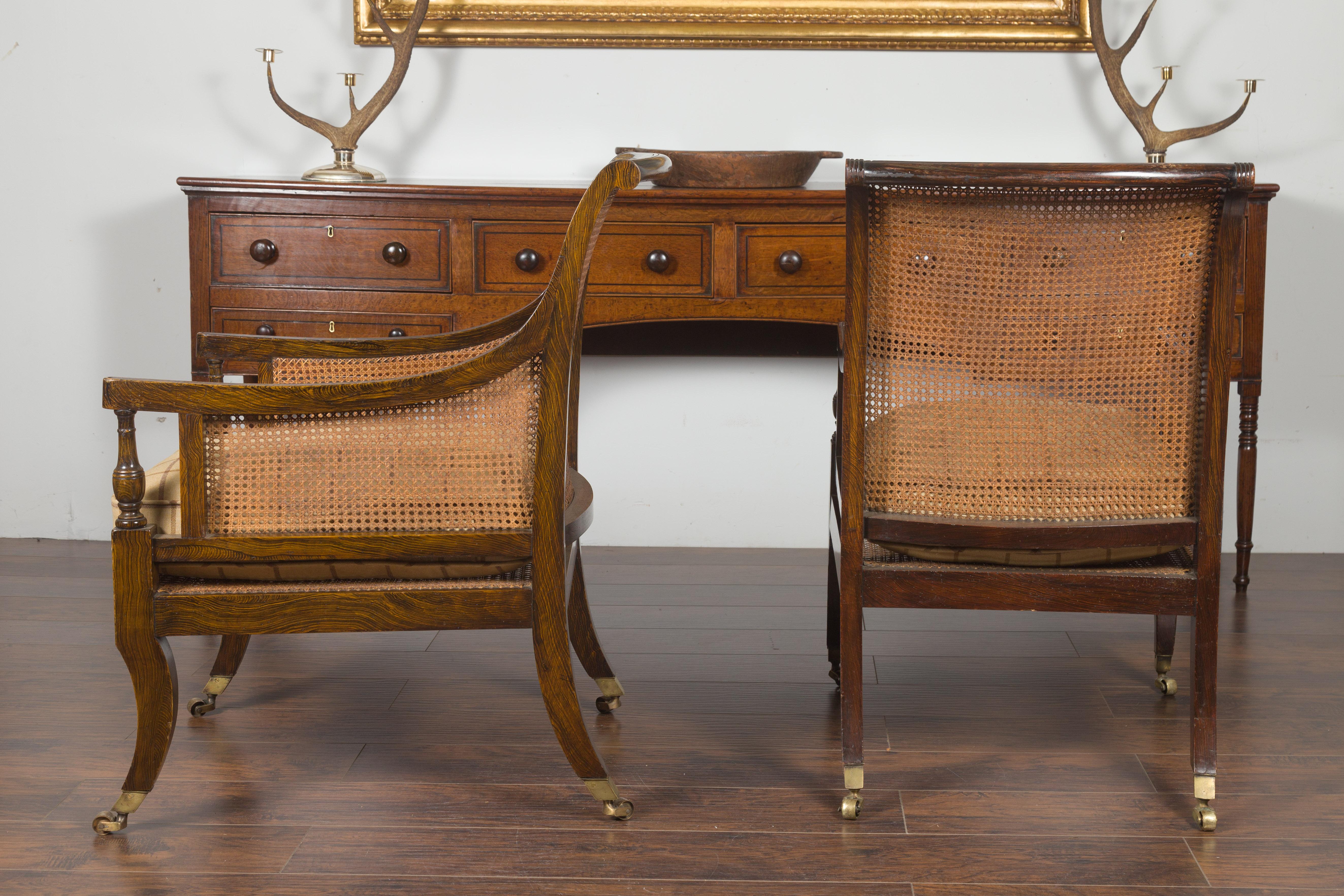 Pair of English 1870s Cane and Oak Library Chairs with Cushions and Casters 9