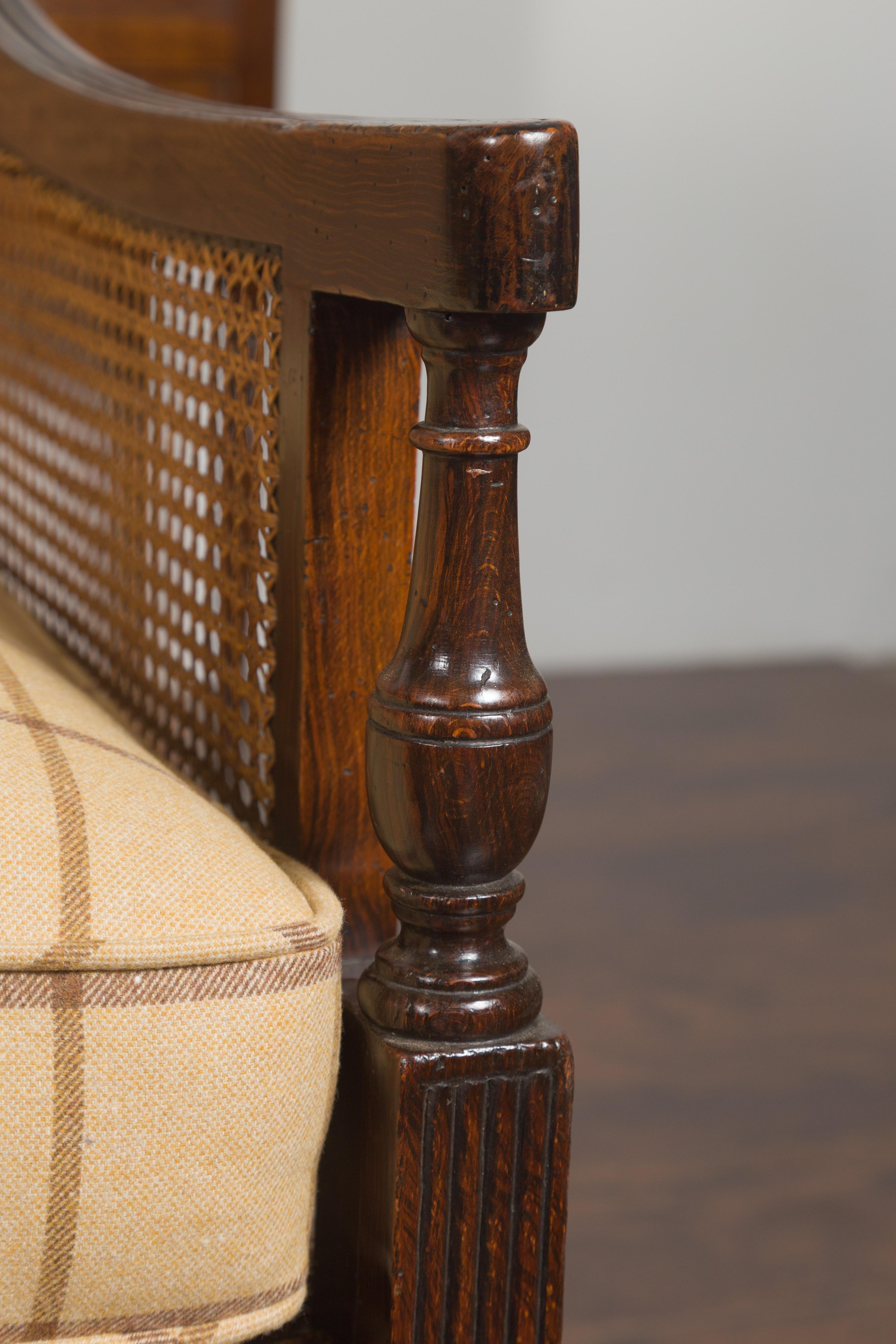 19th Century Pair of English 1870s Cane and Oak Library Chairs with Cushions and Casters