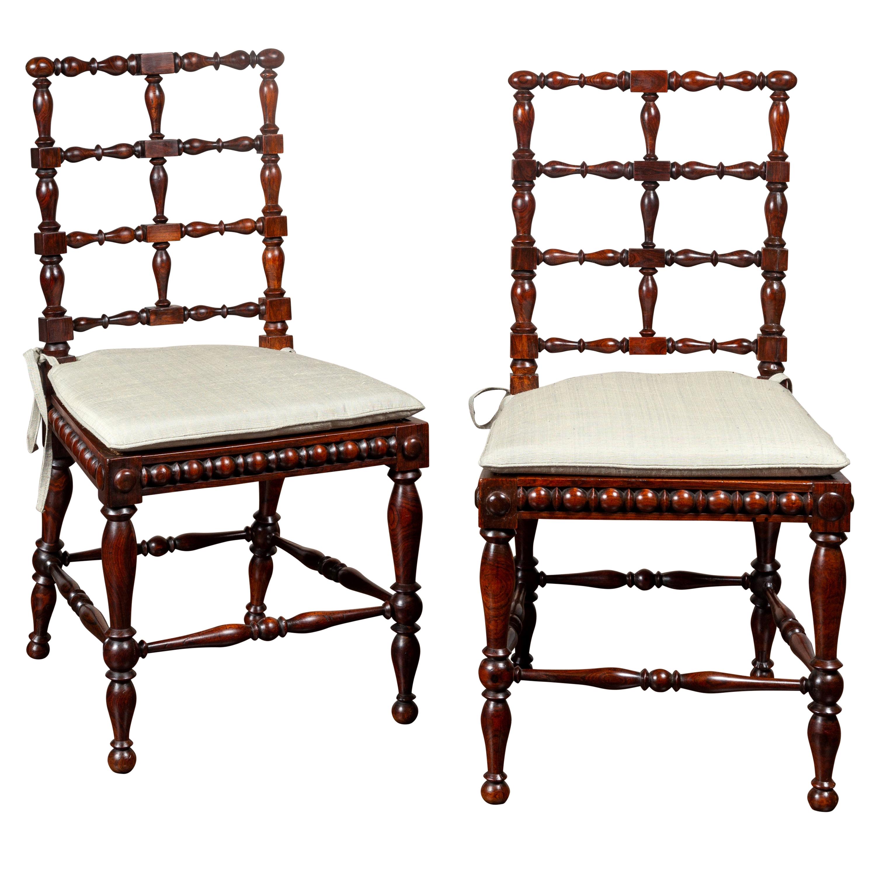 Pair of English 1870s Rosewood Side Chairs with Cane Seats and Turned Spindles