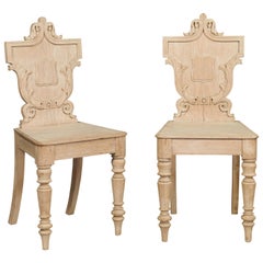Antique Pair of English 1880s Bleached Oak Hall Chairs with Shield-Shaped Carved Backs