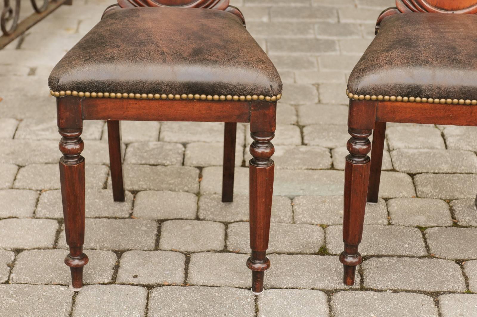 Pair of English 1880s Carved Oak Hall Chairs with Leather Upholstered Seats 7