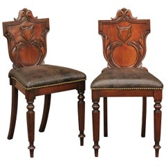 1880s furniture Pair of English 1880s Carved Oak Hall Chairs with Leather Upholstered Seats