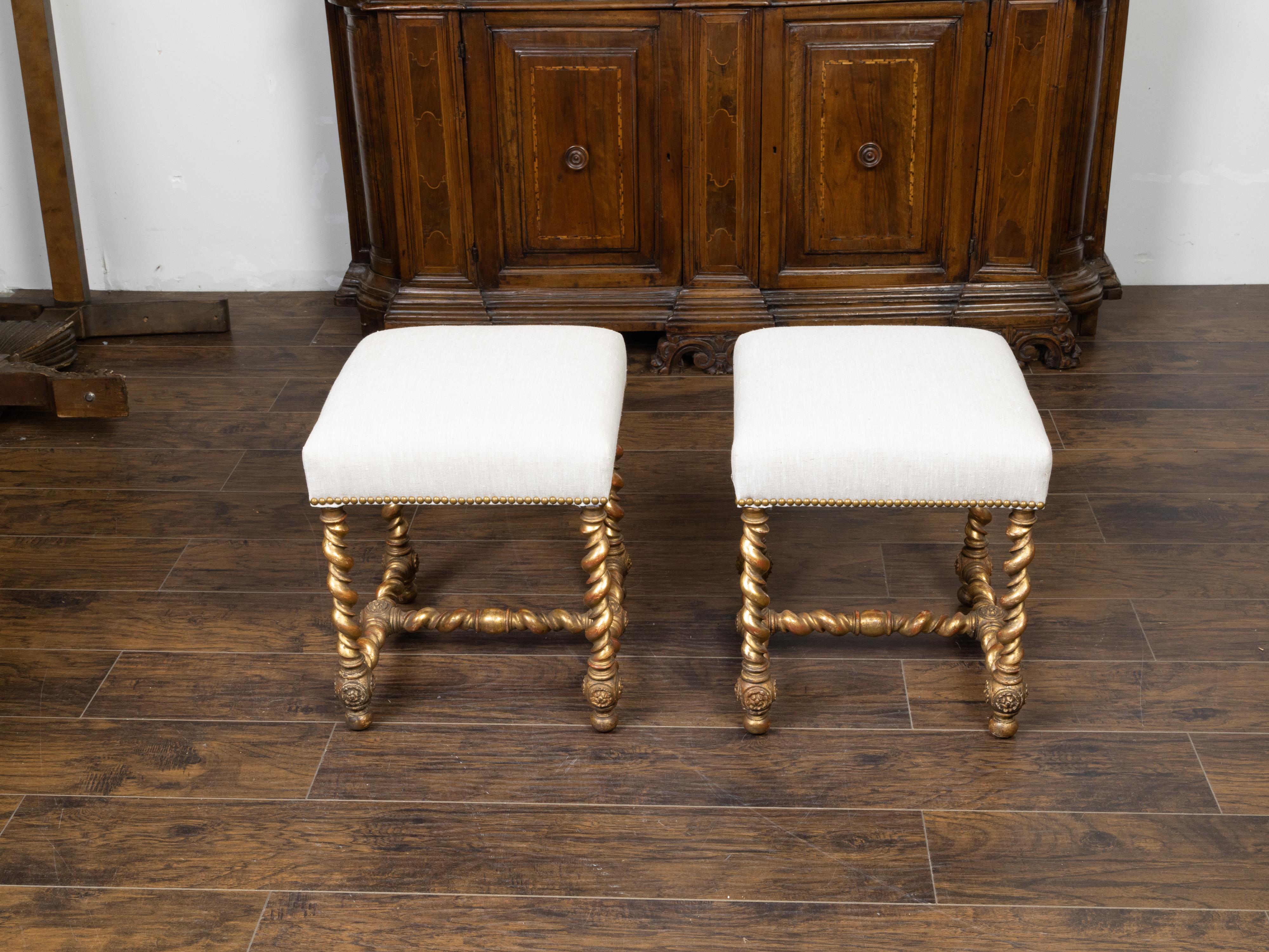Brass Pair of English 1880s Giltwood Barley Twist Stools with New Upholstery For Sale