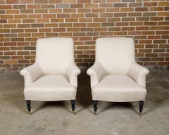 Paar englische Polstersessel aus den 1880er Jahren mit ebonisierten, gedrechselten Beinen auf Rollen